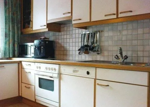 Kitchen or kitchenette in Ferienwohnungen Egger