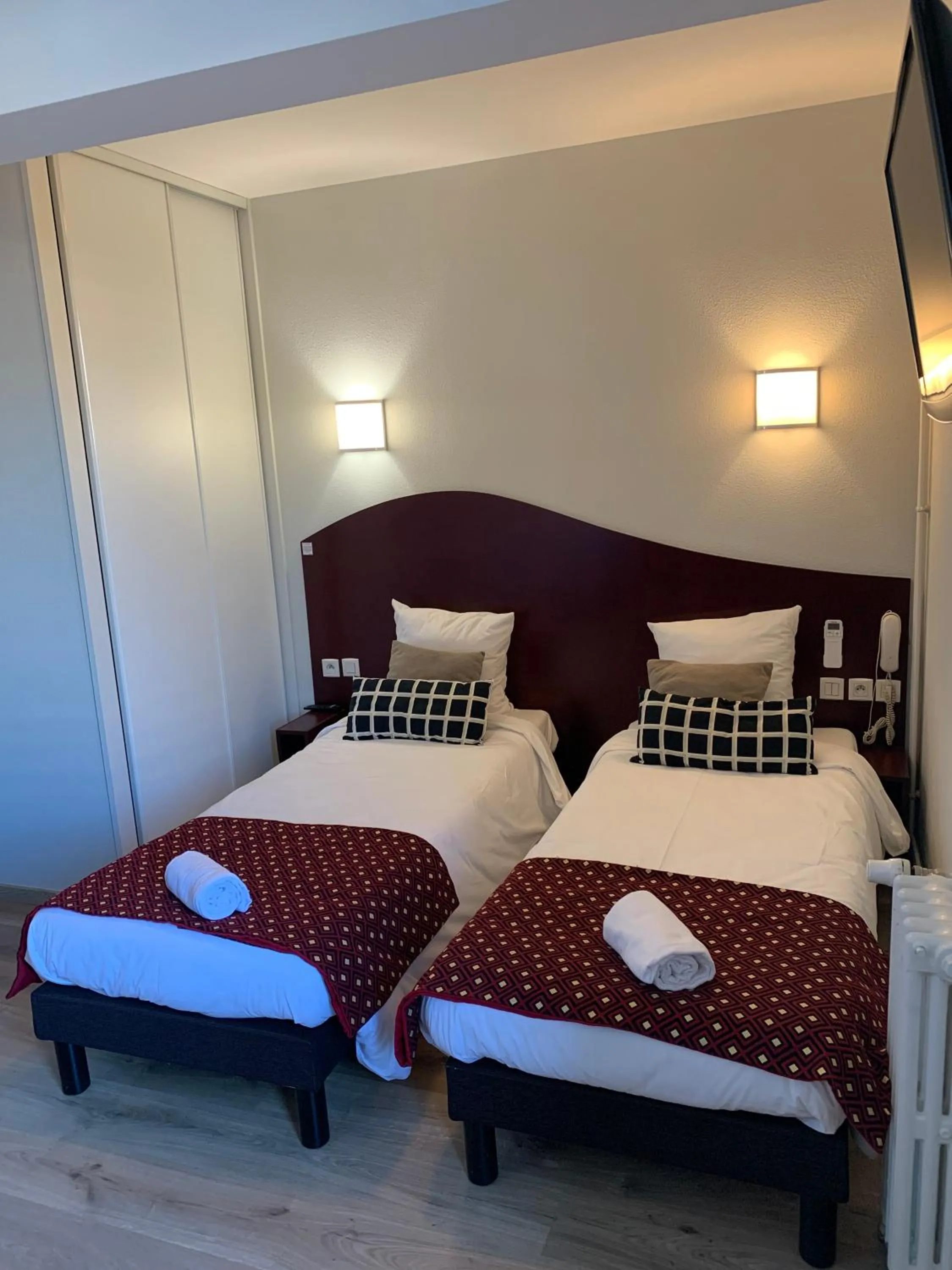 Bed in Hotel les Commercants