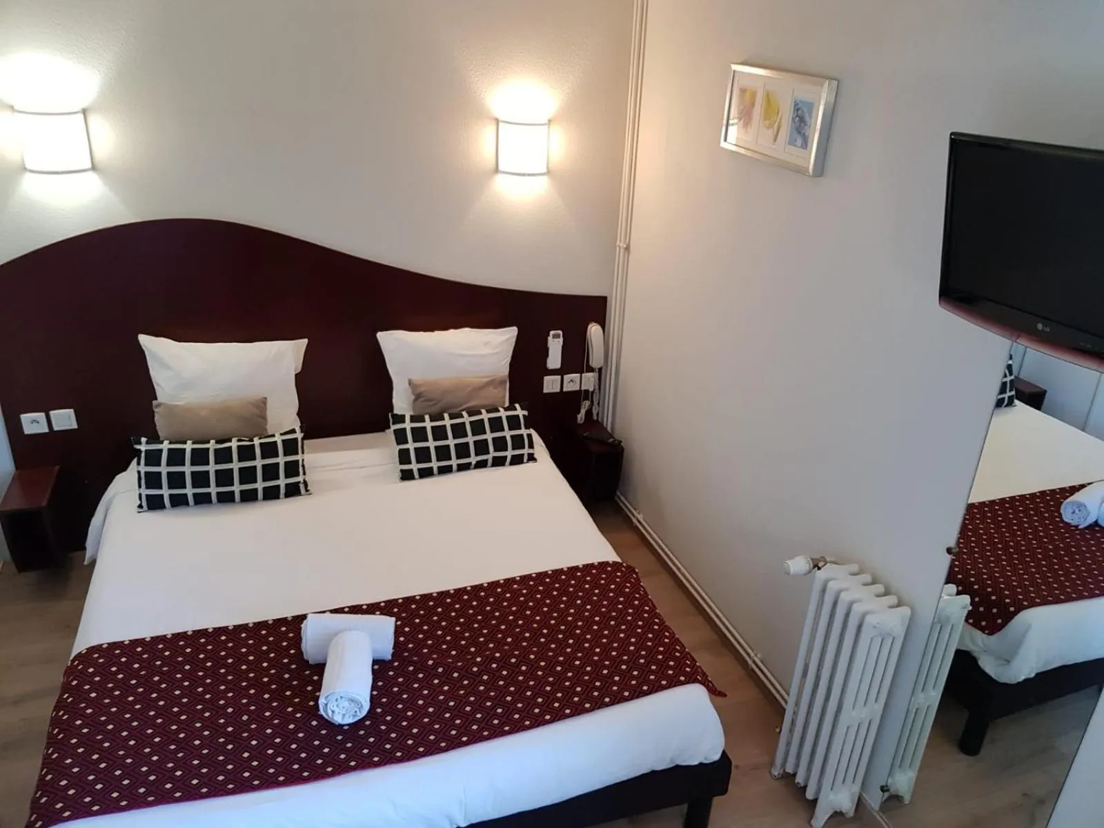 Bed in Hotel les Commercants