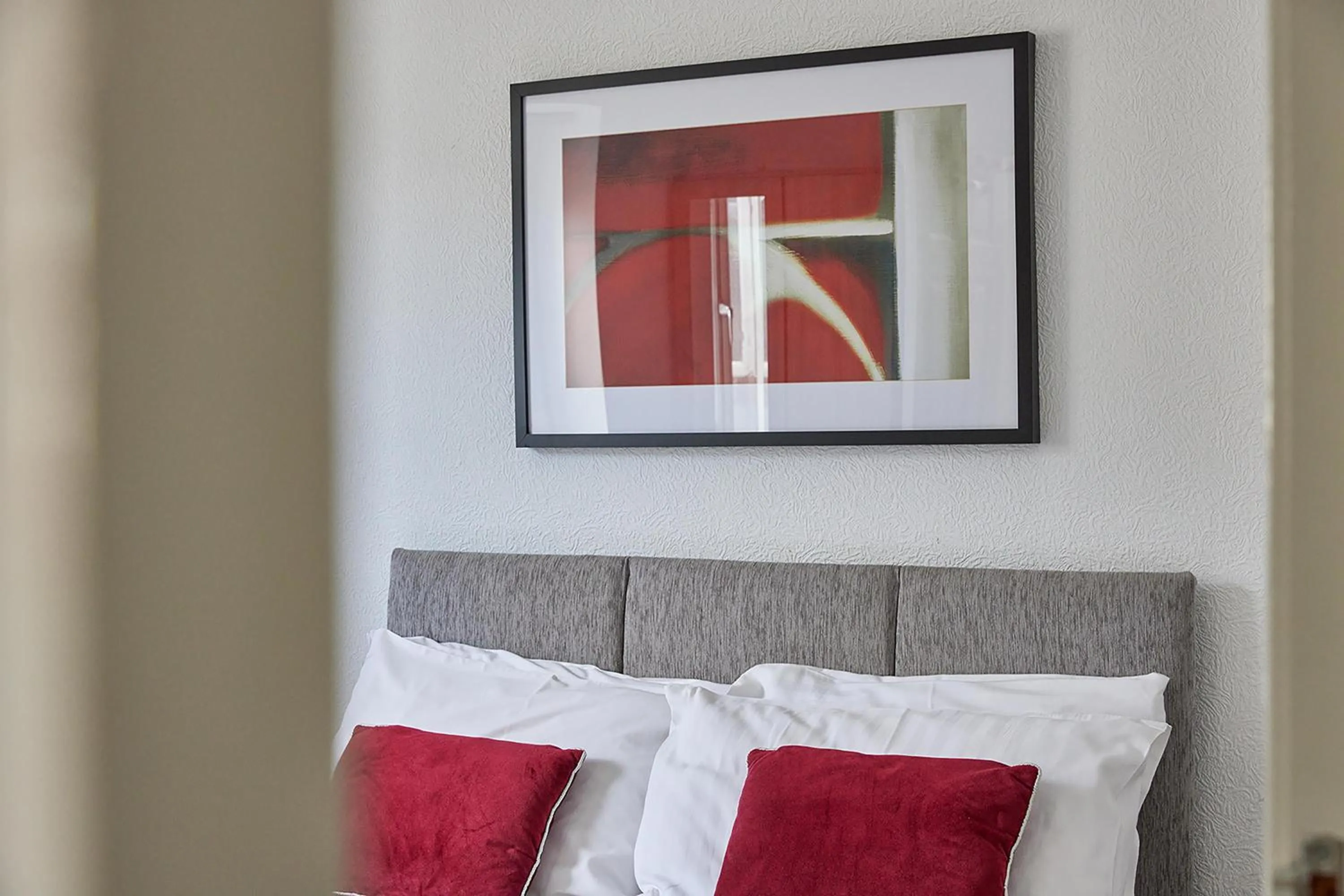 Bed in Pleasure Holiday Apartments