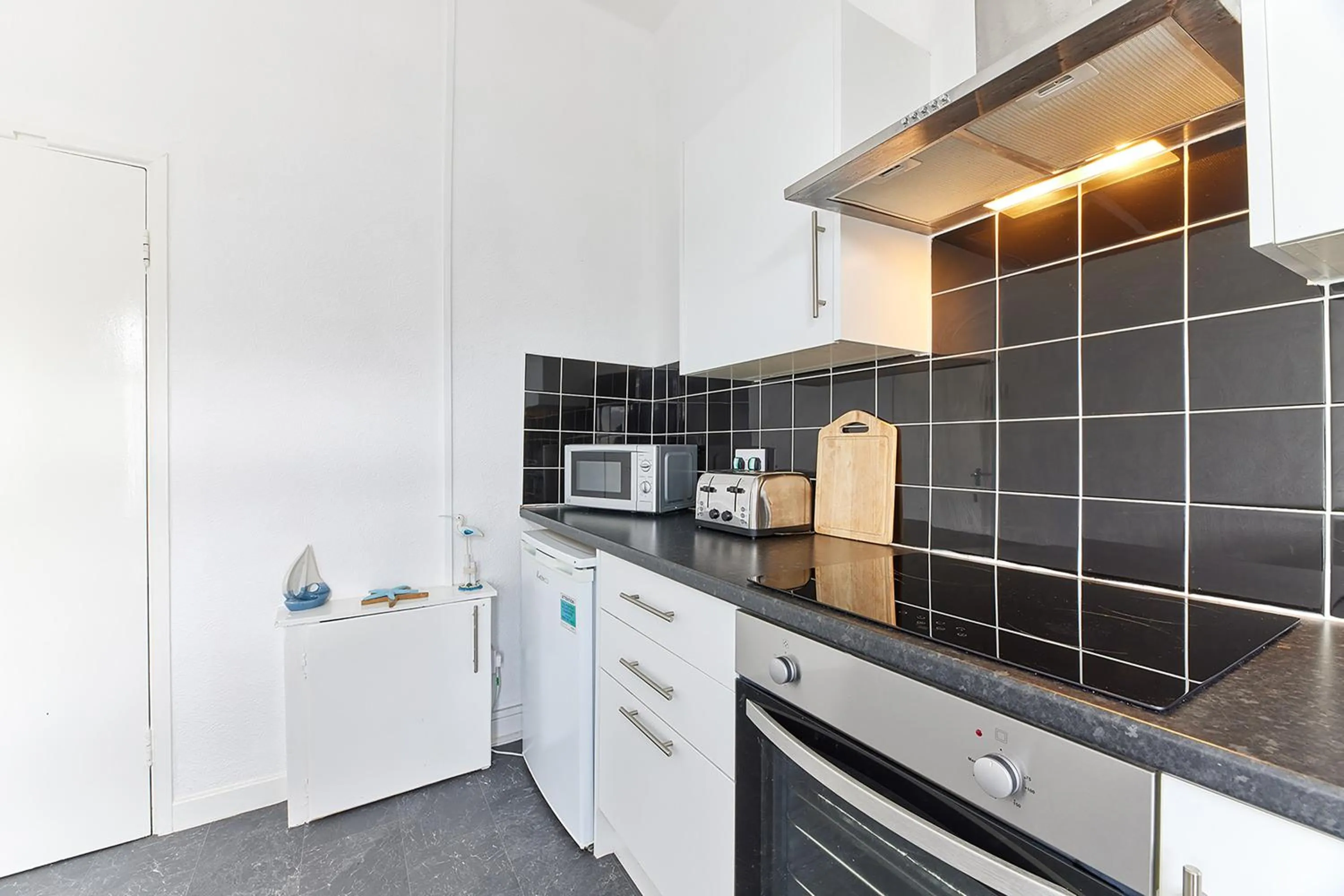Kitchen or kitchenette in Pleasure Holiday Apartments