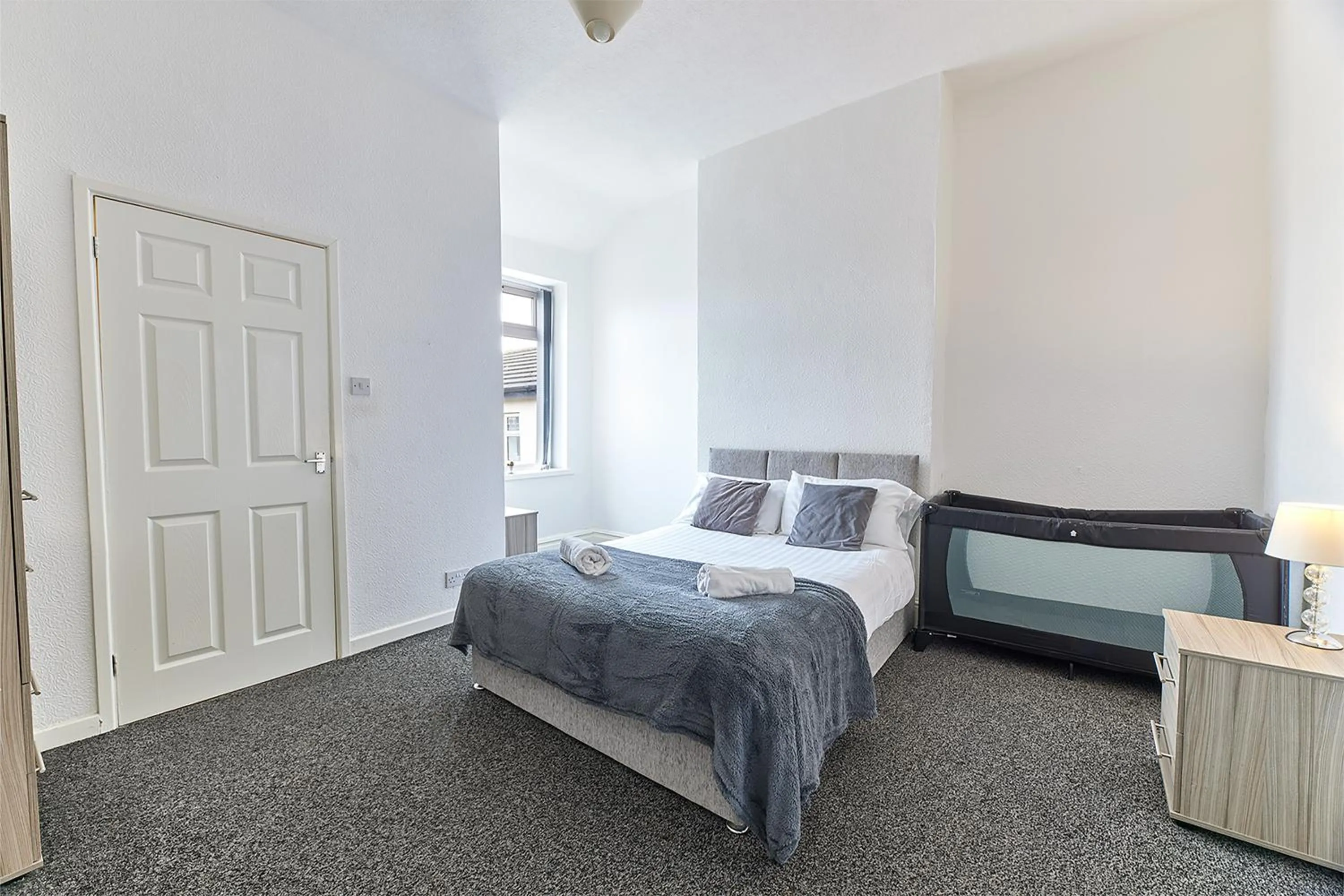 Bed in Pleasure Holiday Apartments