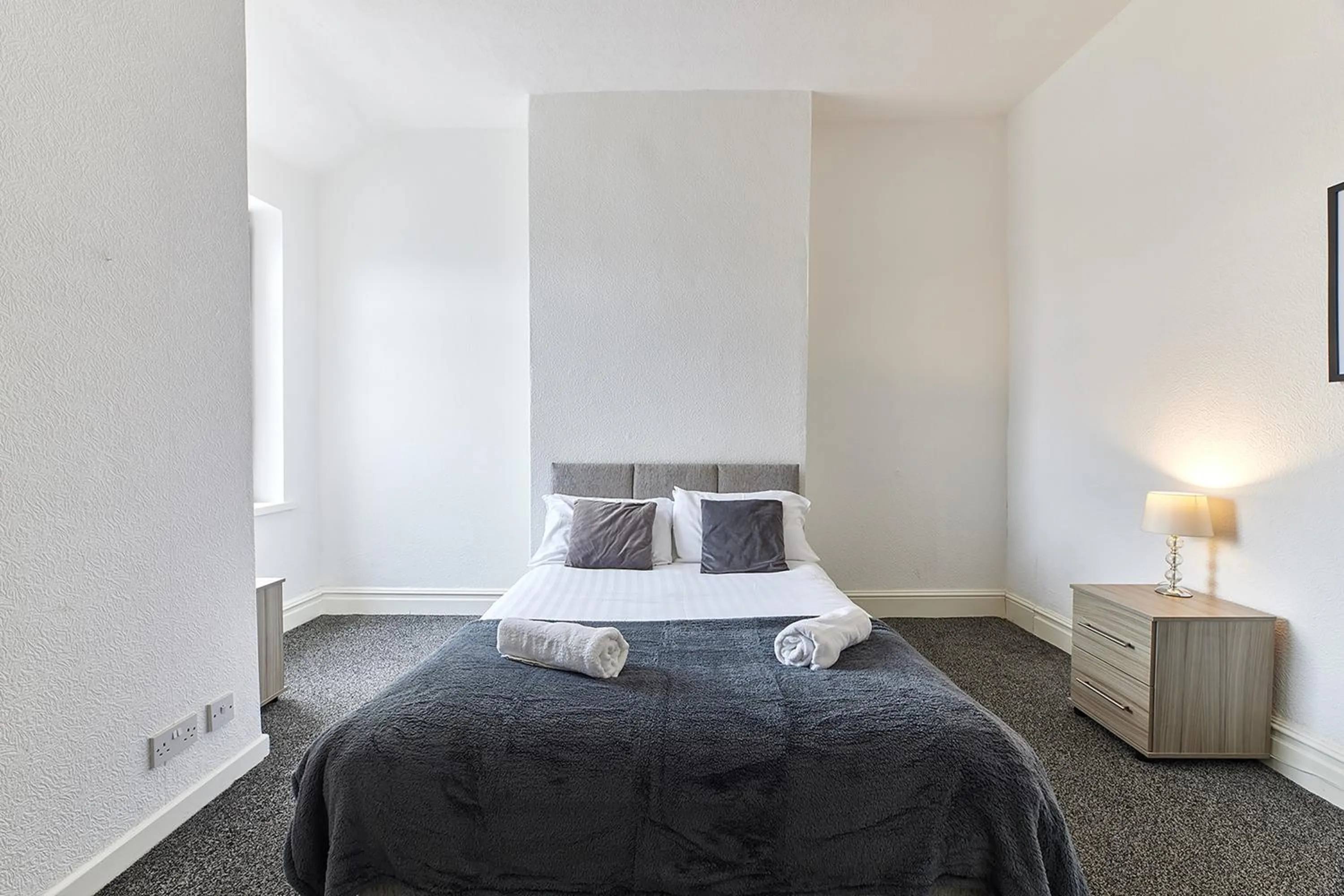 Bed in Pleasure Holiday Apartments