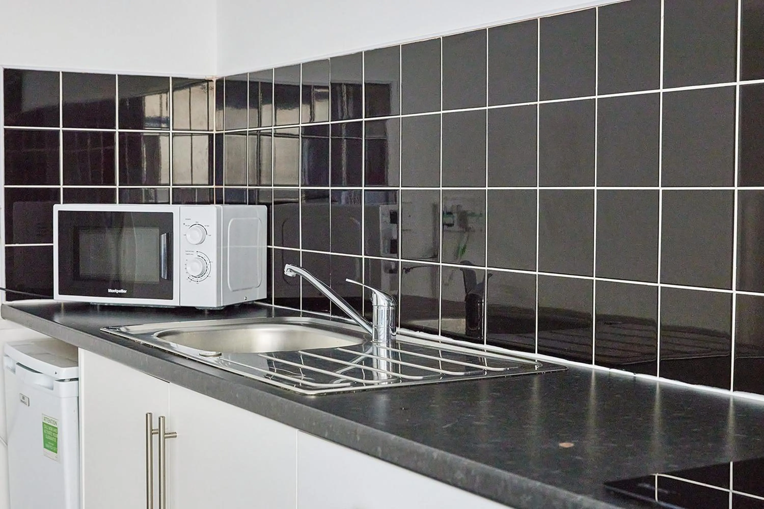 Kitchen or kitchenette in Pleasure Holiday Apartments