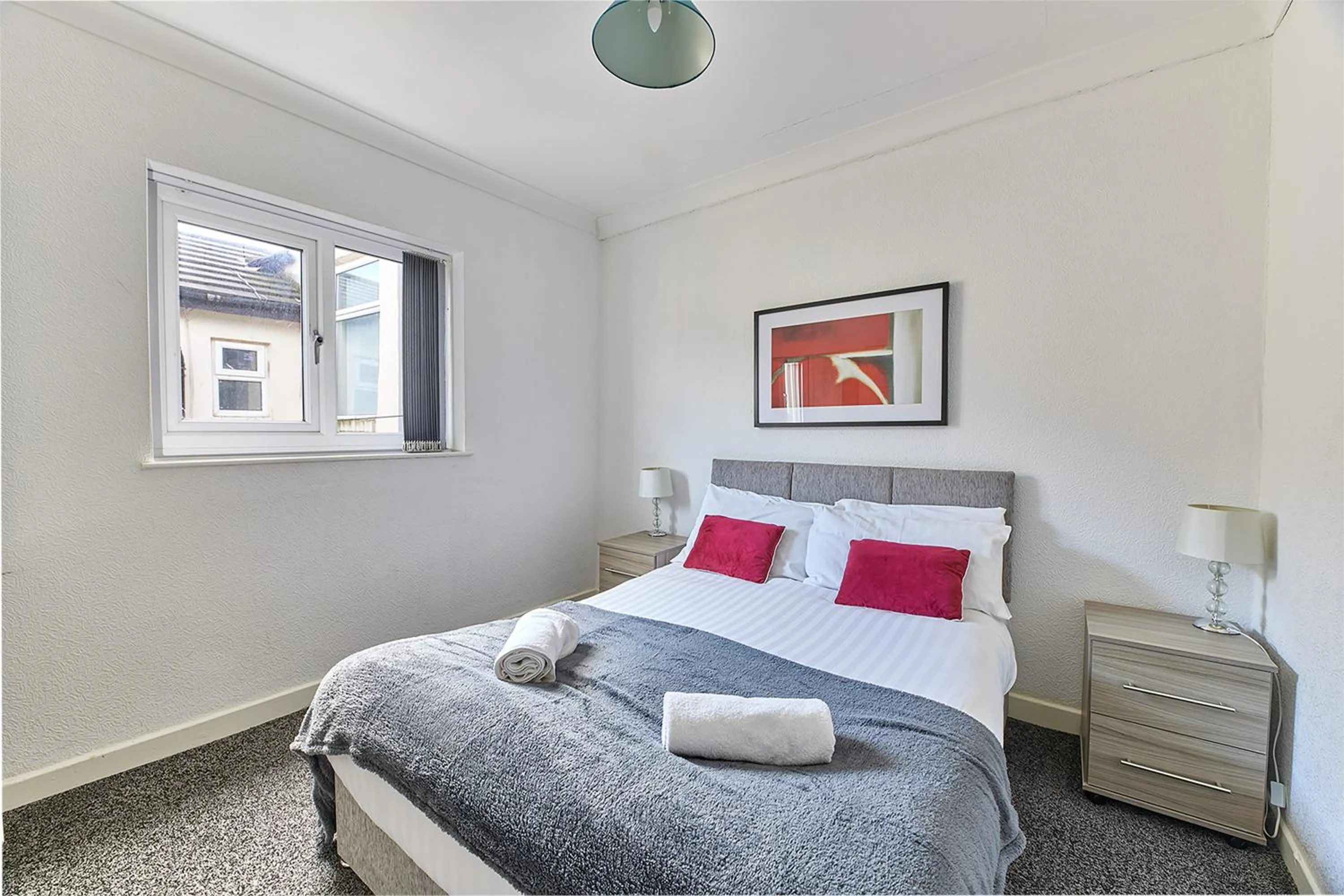 Bed in Pleasure Holiday Apartments