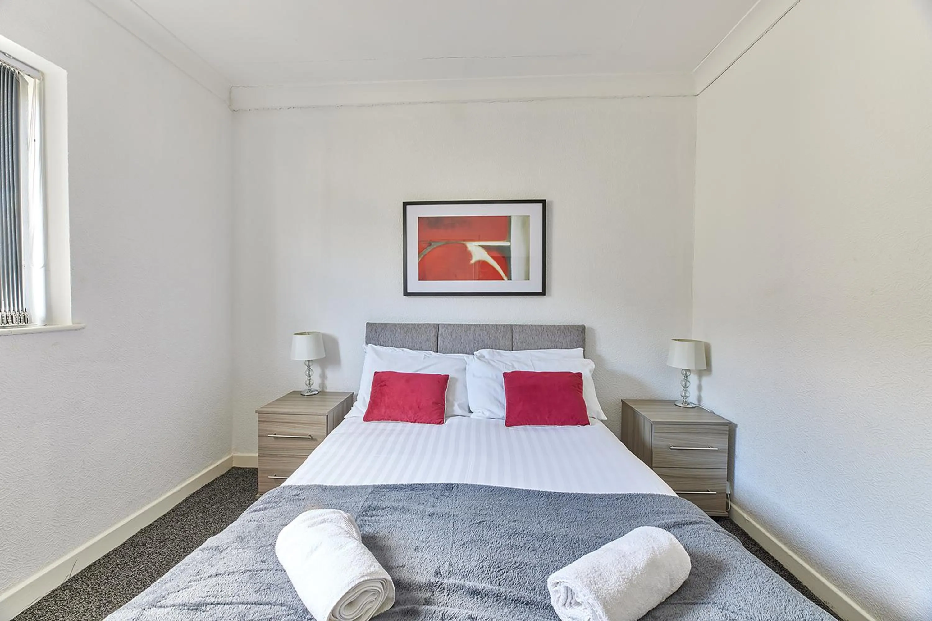 Bed in Pleasure Holiday Apartments