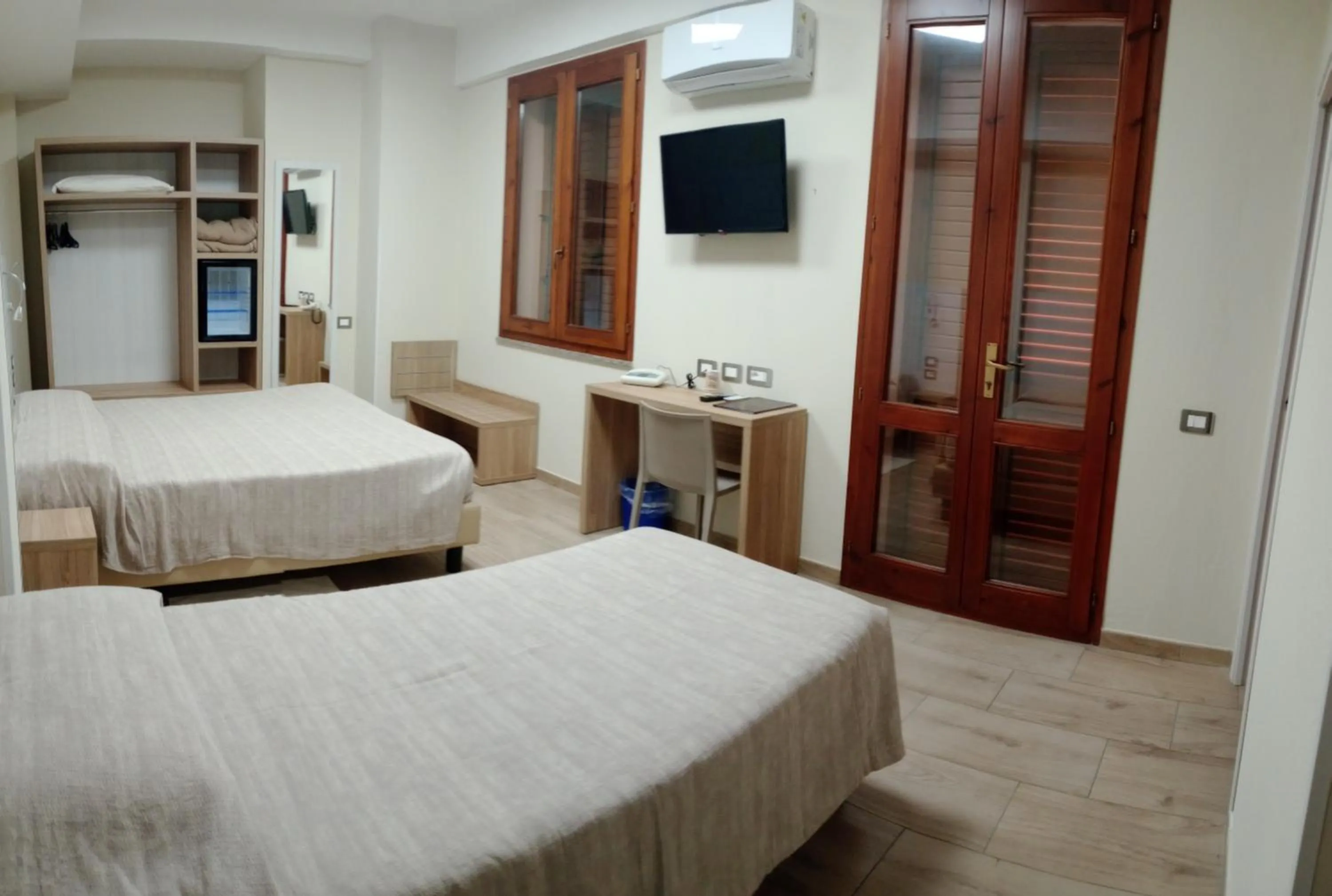 Bed in Hotel Meridiana