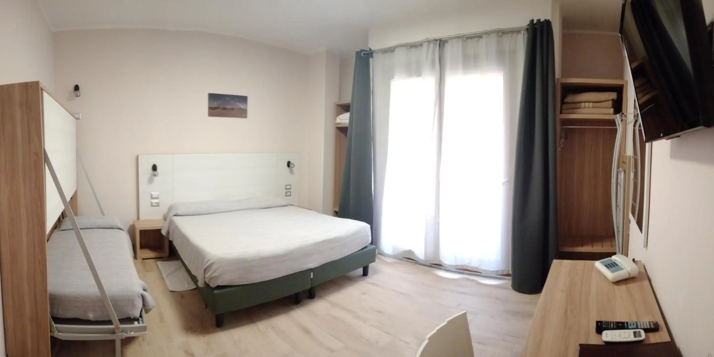 Bed in Hotel Meridiana