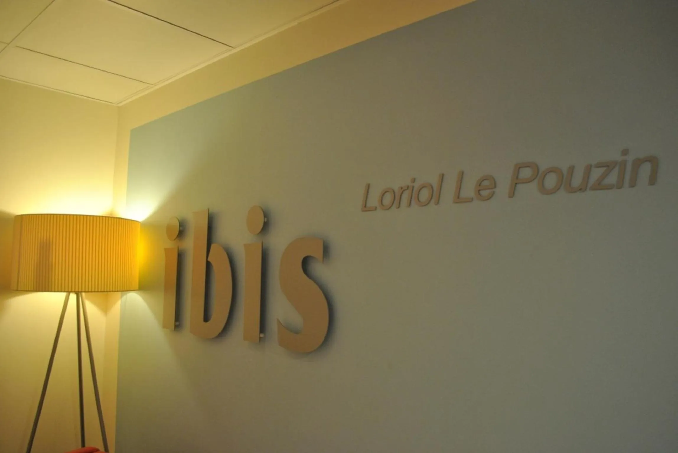 Property logo or sign in ibis Loriol Le Pouzin
