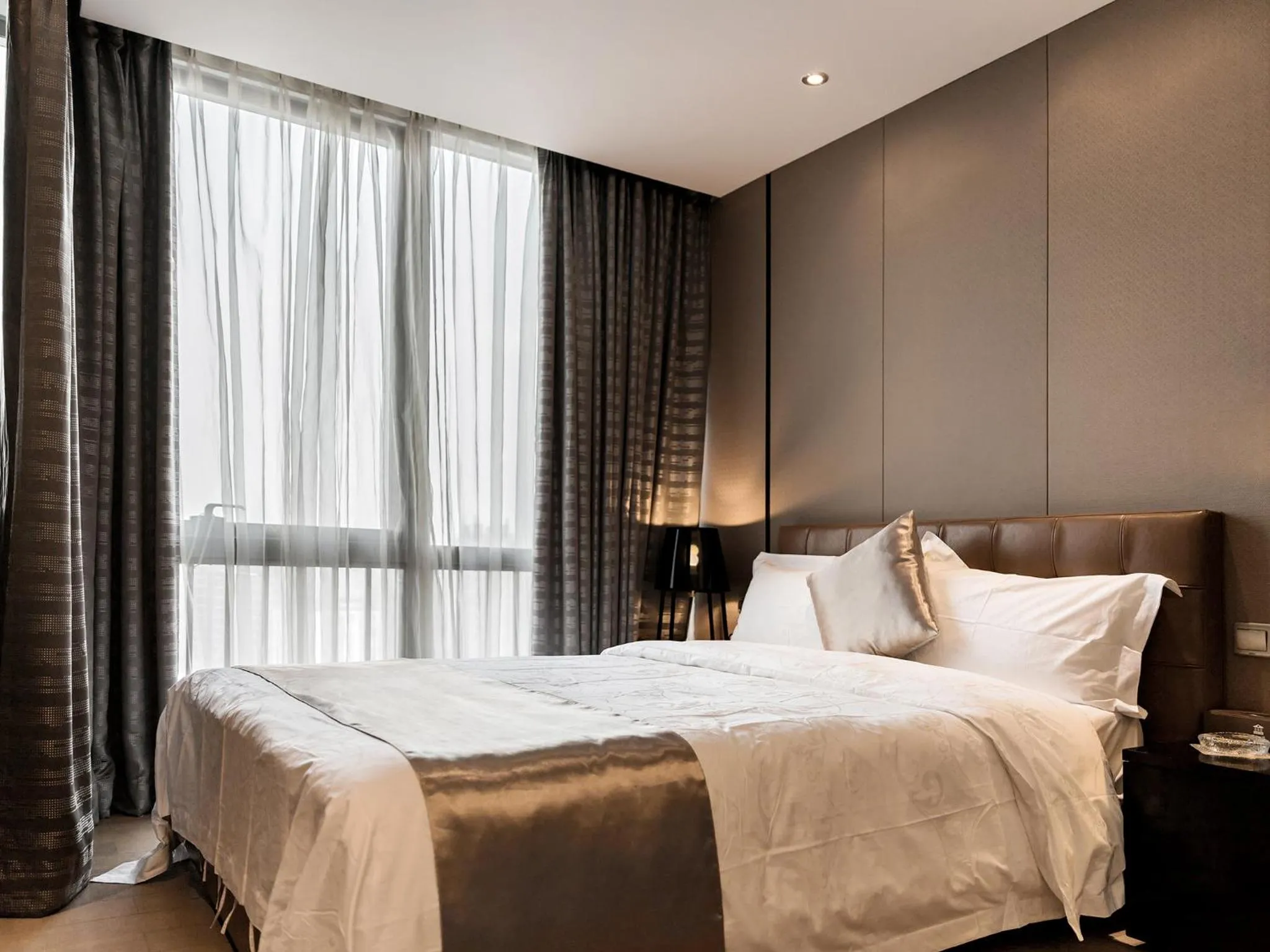 Photo of the whole room, Bed in Boman Holiday Apartment Beijing Road Jie Deng Du Hui Branch