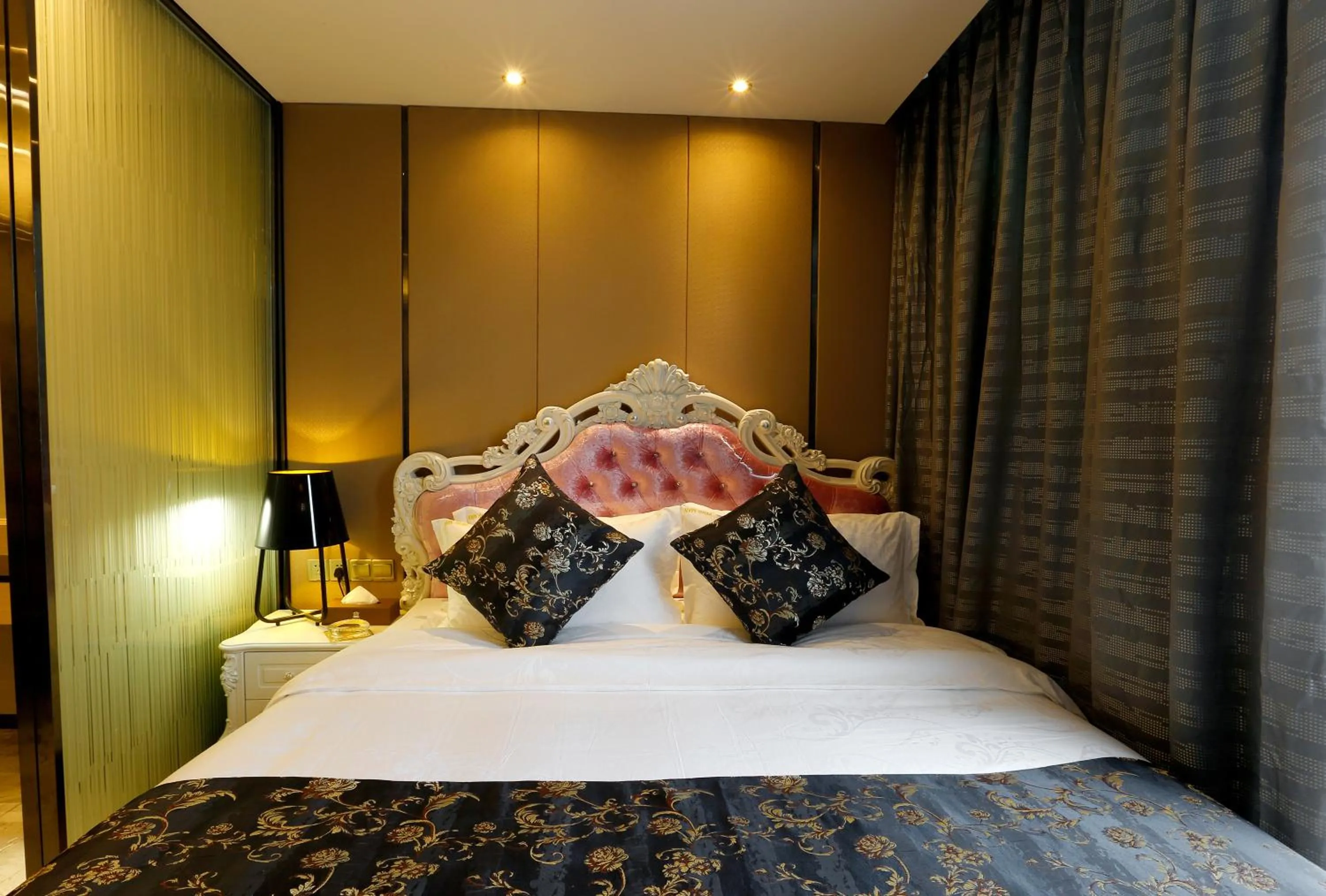 Bed in Boman Holiday Apartment Beijing Road Jie Deng Du Hui Branch