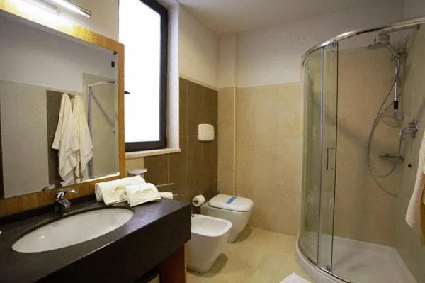 Bathroom in Hotel Messenion