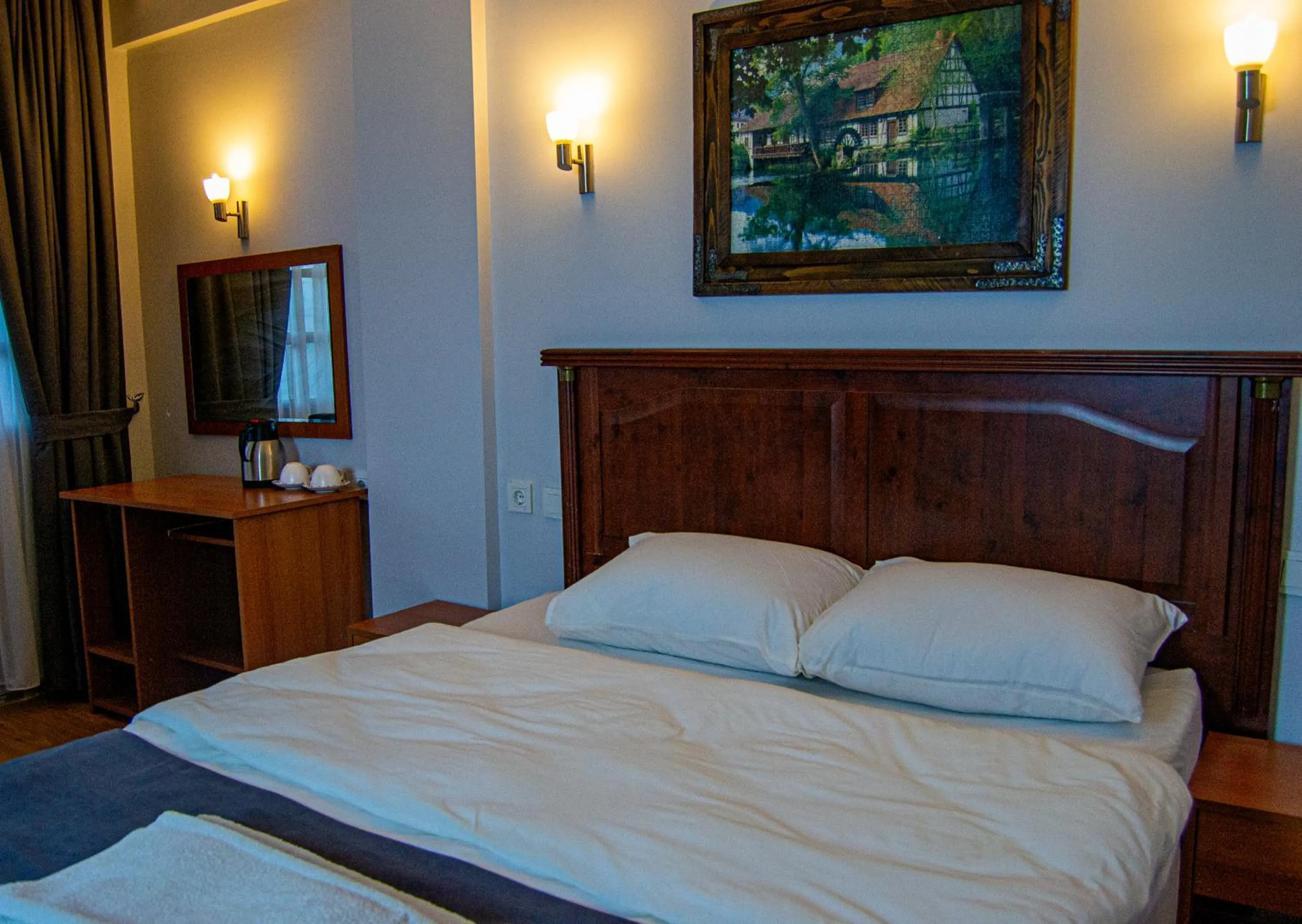 Bed in Kaltur Boutique Hotel