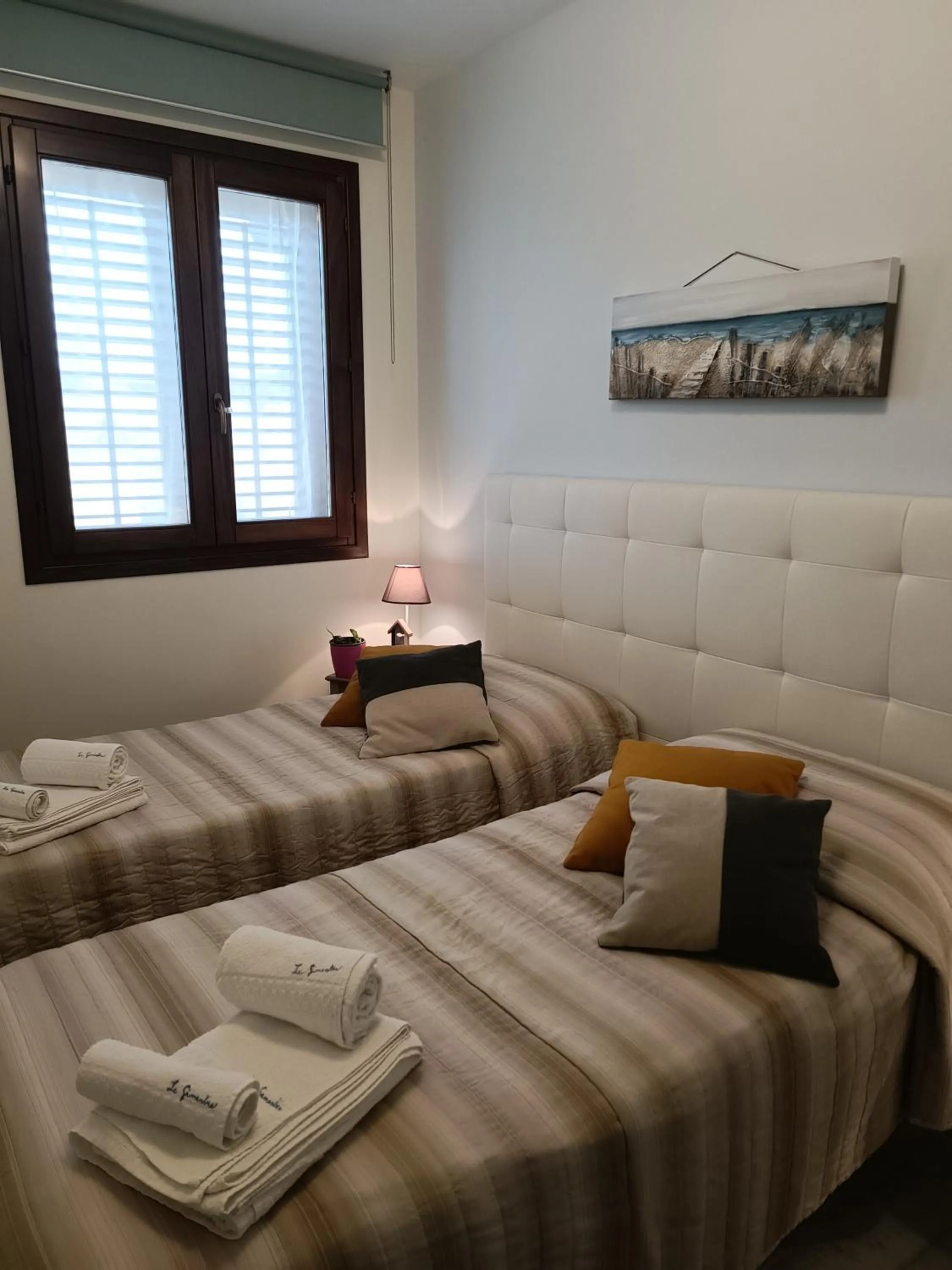 Bed in Appartamento Le Ginestre