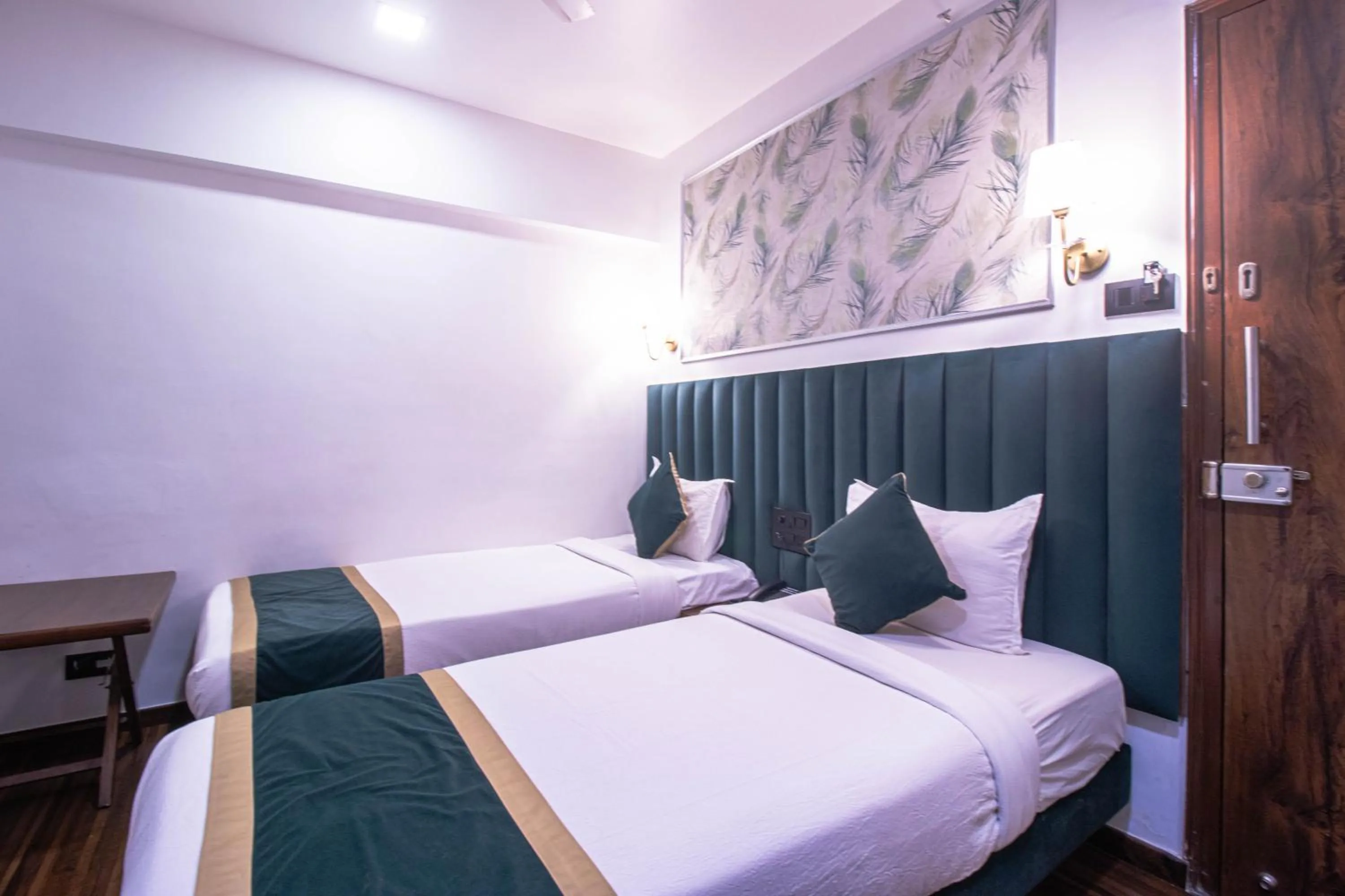 Bed in J Hotel and Banquets