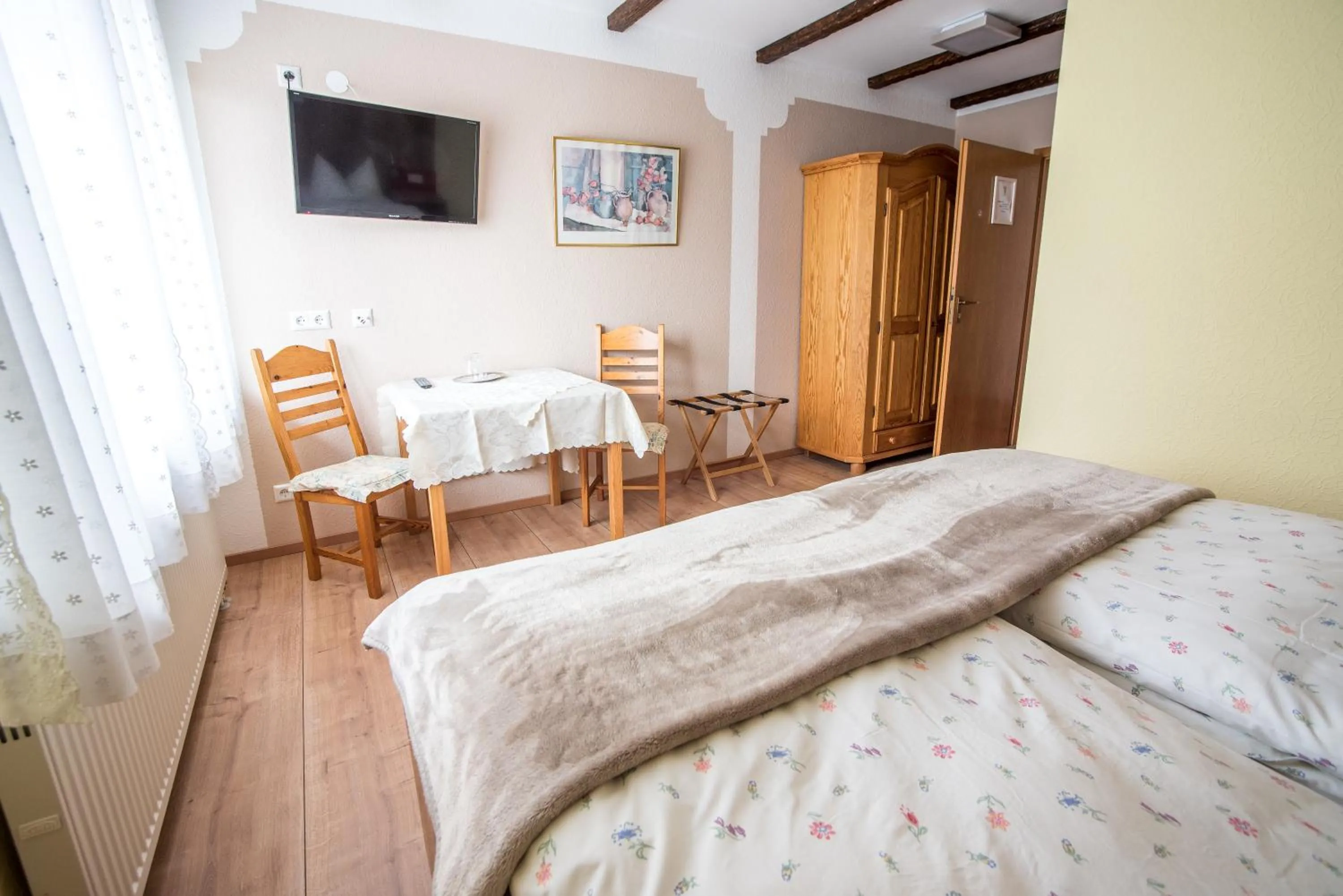 Photo of the whole room, Bed in Hotel Schweizerhof