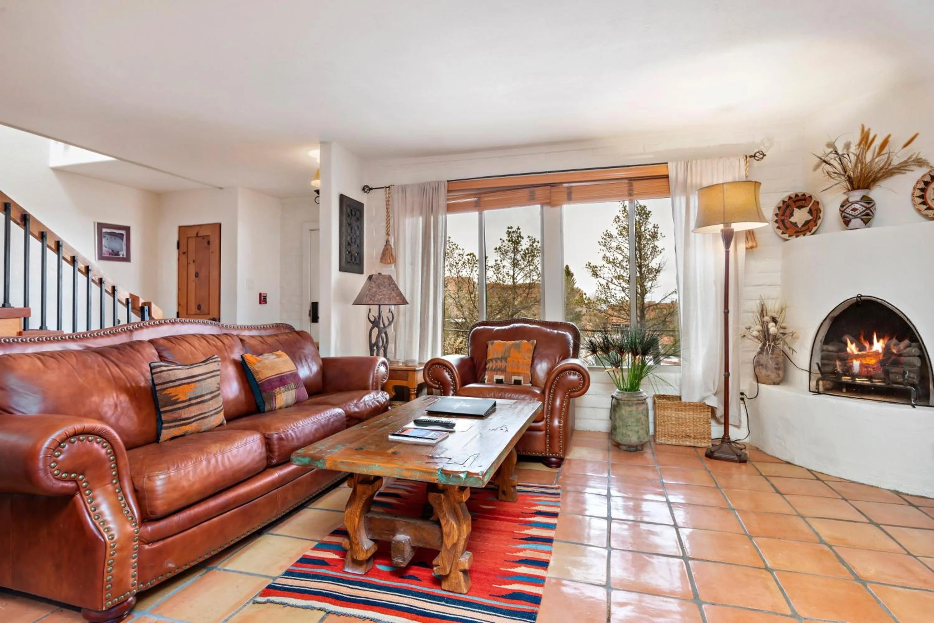 Living room in Fort Marcy Suites by All Seasons Resort Lodging