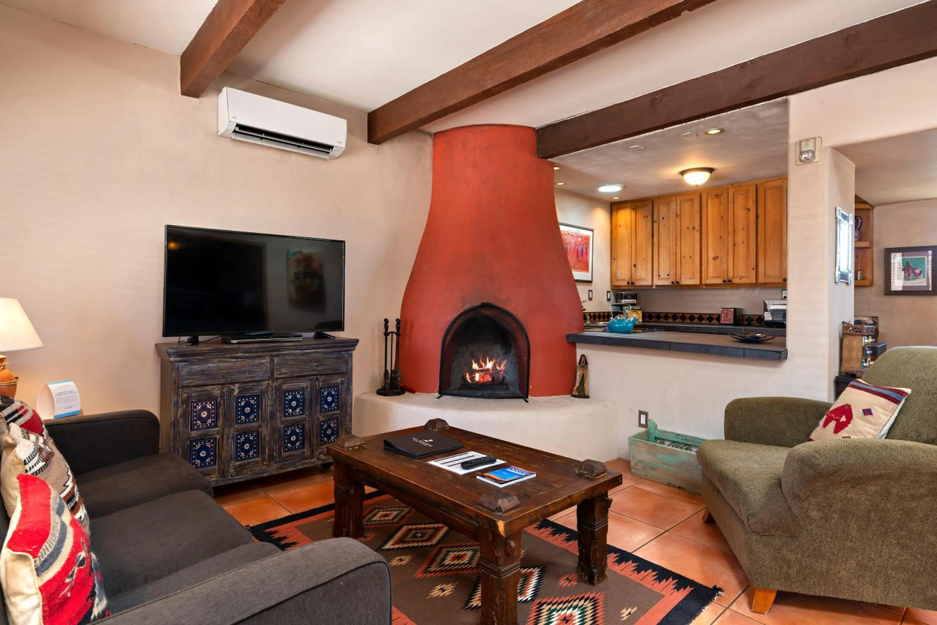 Living room in Fort Marcy Suites by All Seasons Resort Lodging