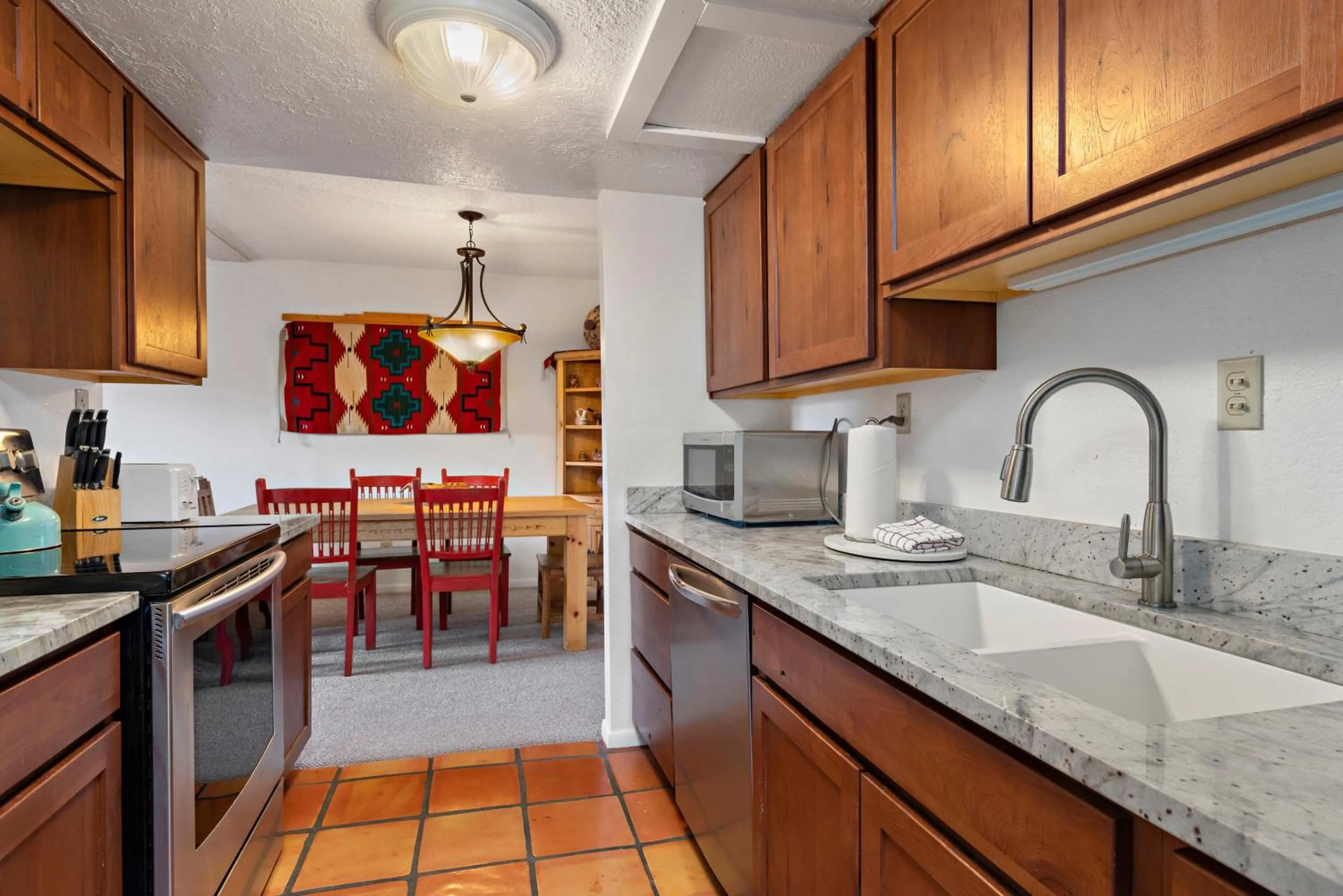 Kitchen or kitchenette in Fort Marcy Suites by All Seasons Resort Lodging