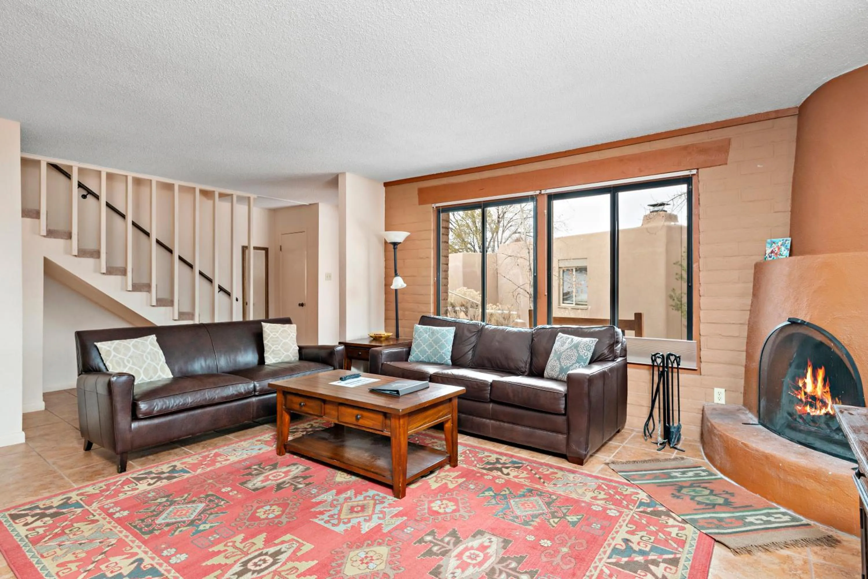 Living room in Fort Marcy Suites by All Seasons Resort Lodging