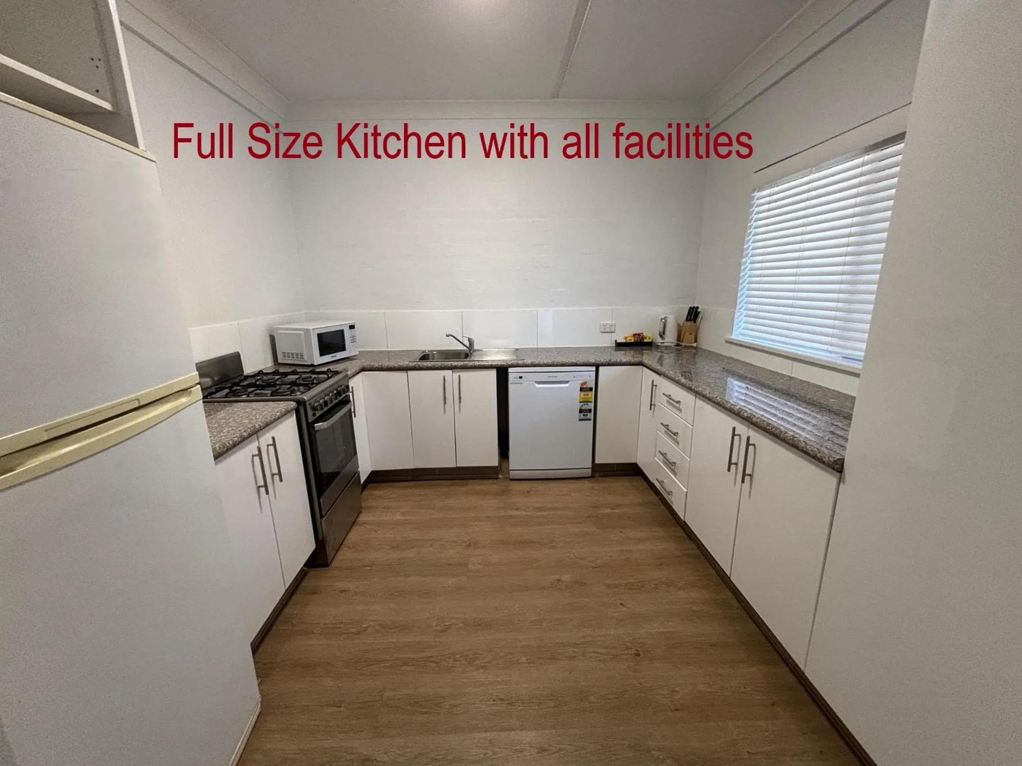 Kitchen or kitchenette in Oxley Court Serviced Apartments