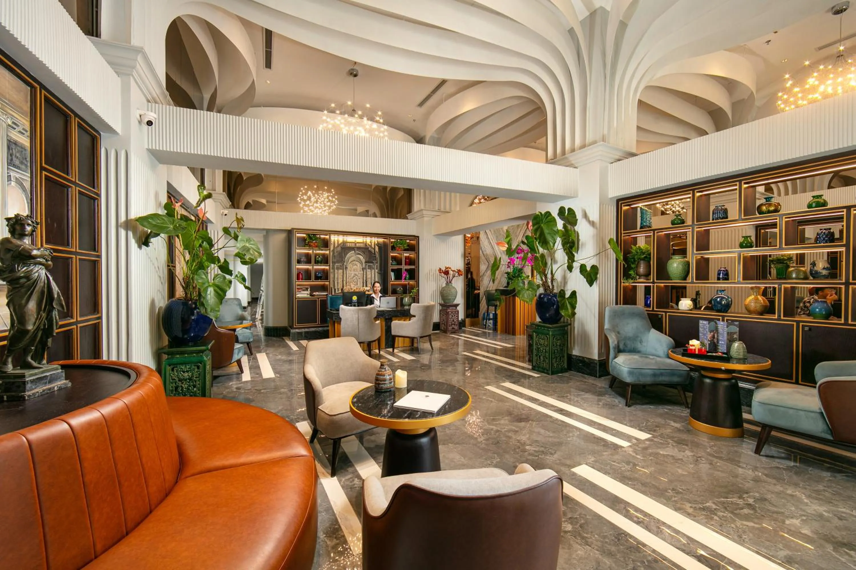 Lobby or reception in MAY DE VILLE Lakeside Hotel