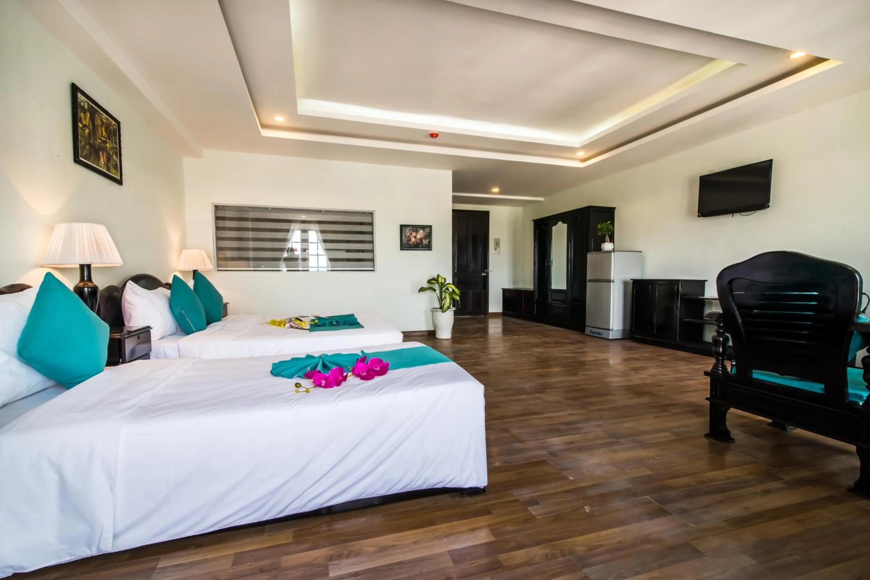 Photo of the whole room, Bed in The Sunriver Boutique Hotel Hue
