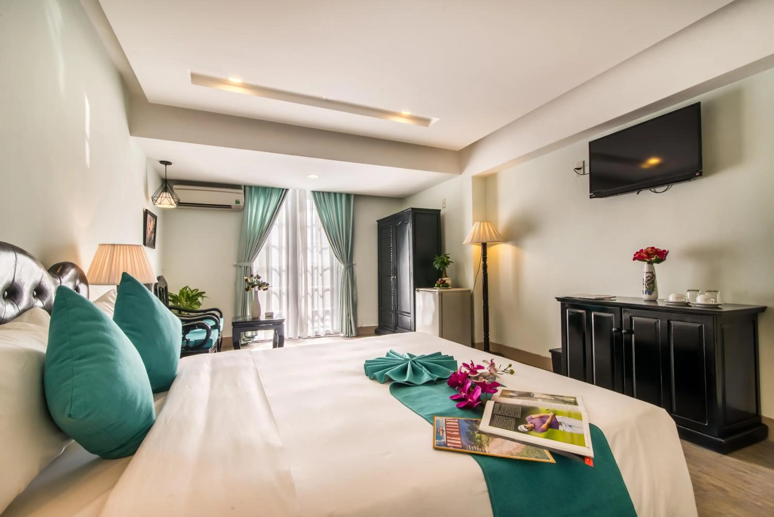 Bed in The Sunriver Boutique Hotel Hue