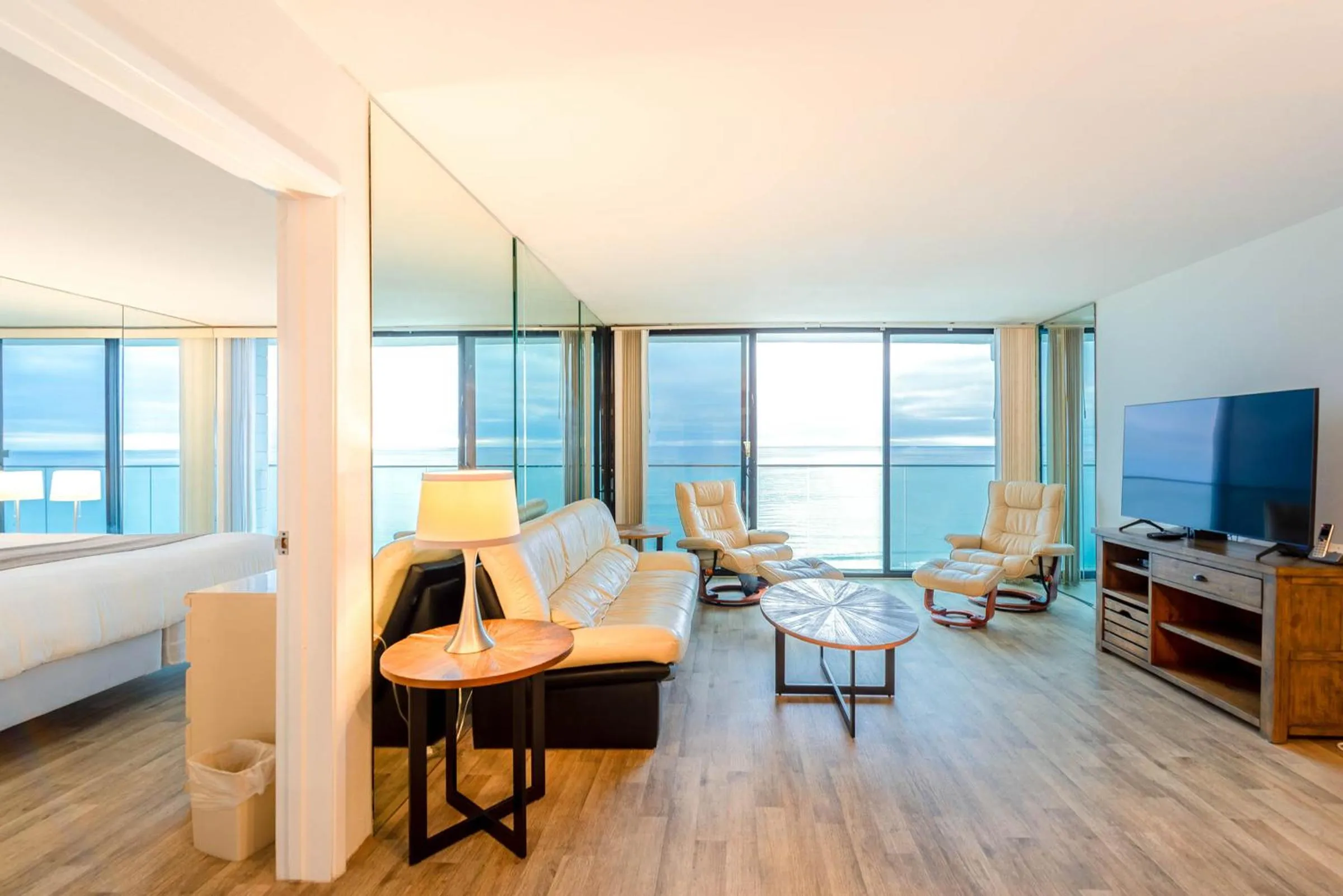 Living room, Bed in Capri by the Sea by All Seasons Resort Lodging