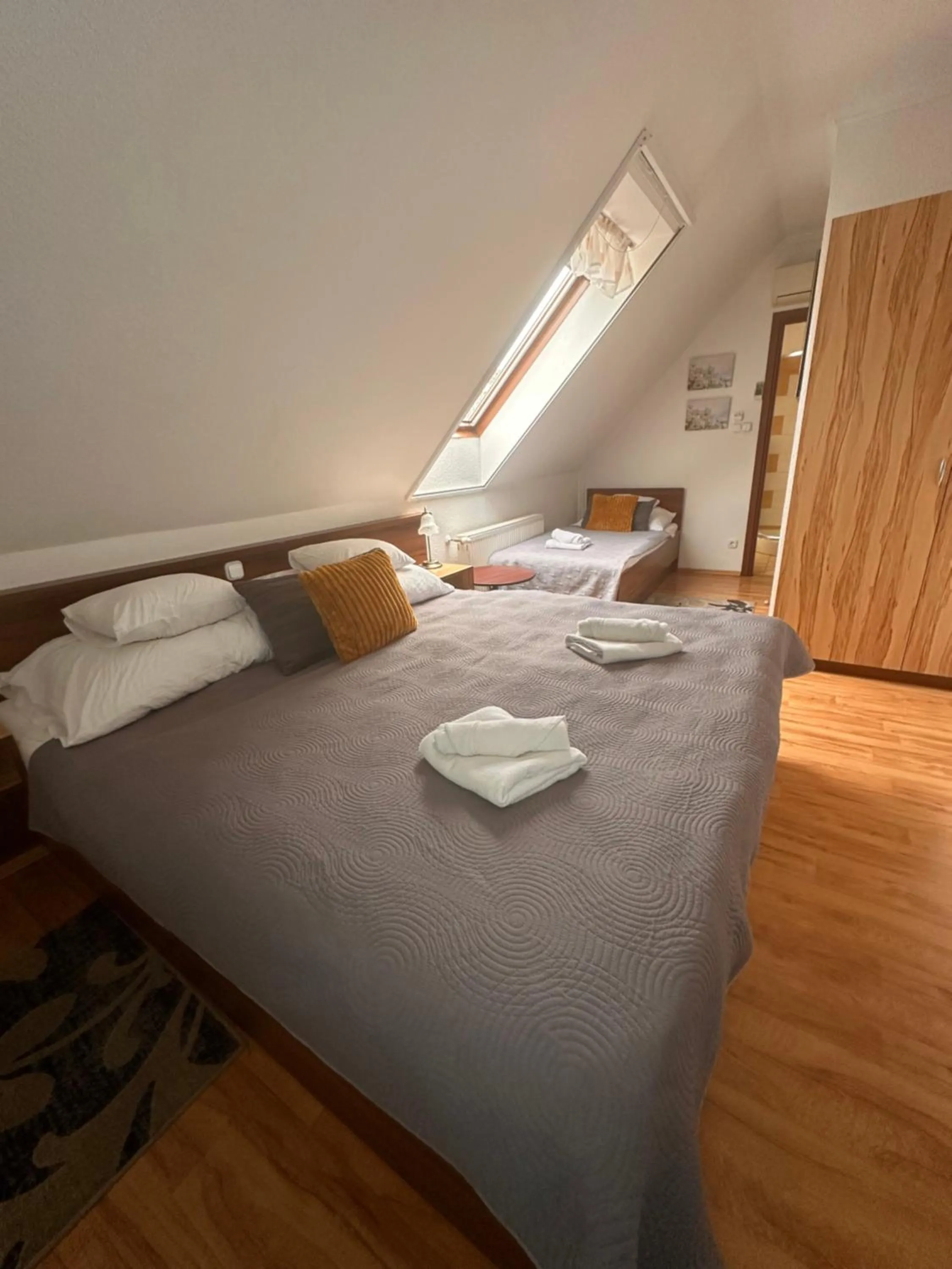 Bed in Le Rose Suites & Park Hotel