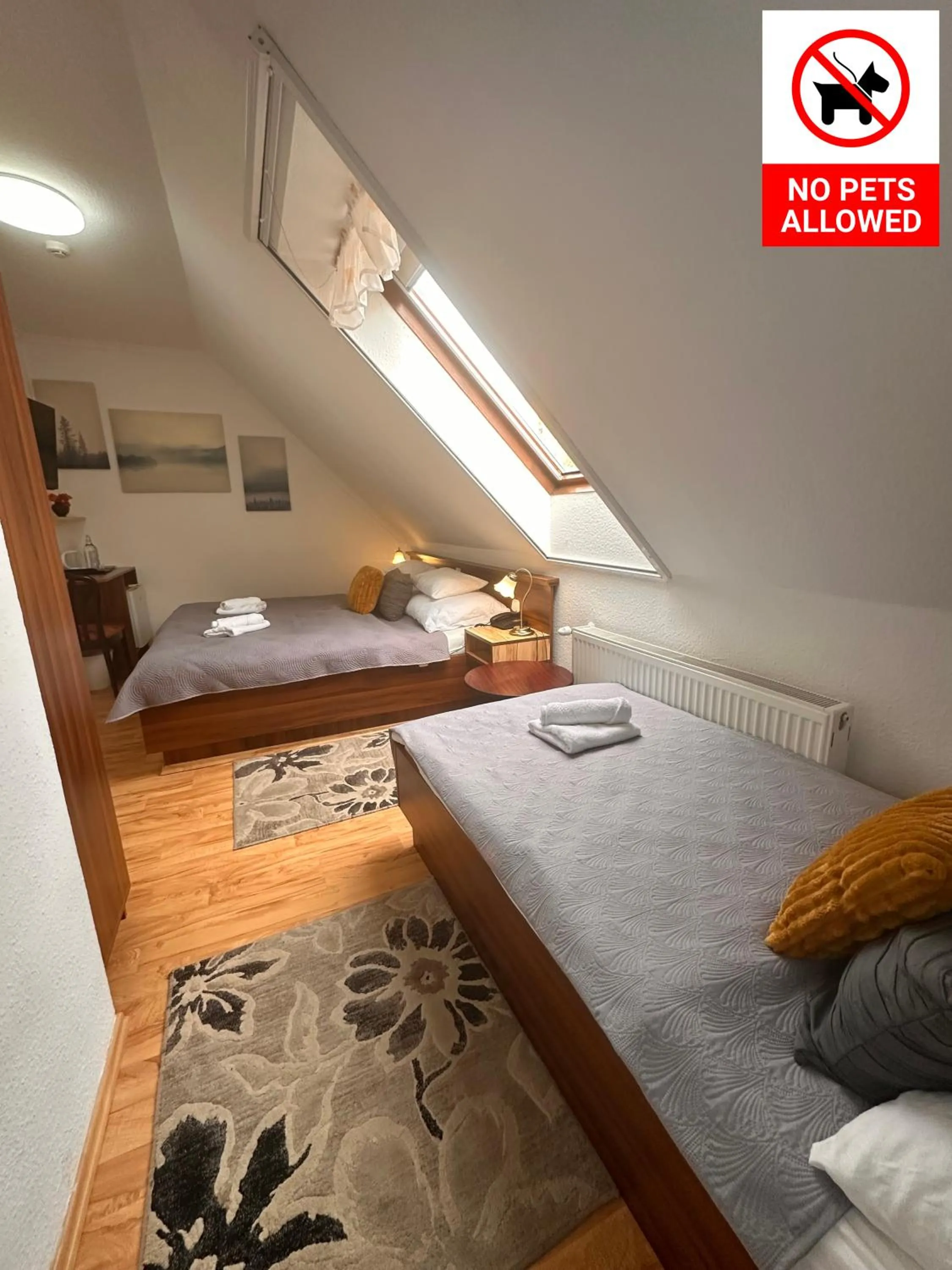 Bed in Le Rose Suites & Park Hotel