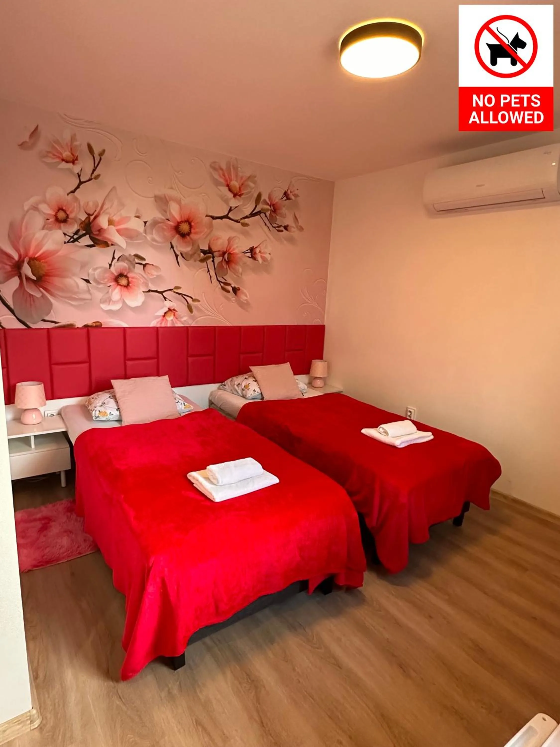 Bed in Le Rose Suites & Park Hotel