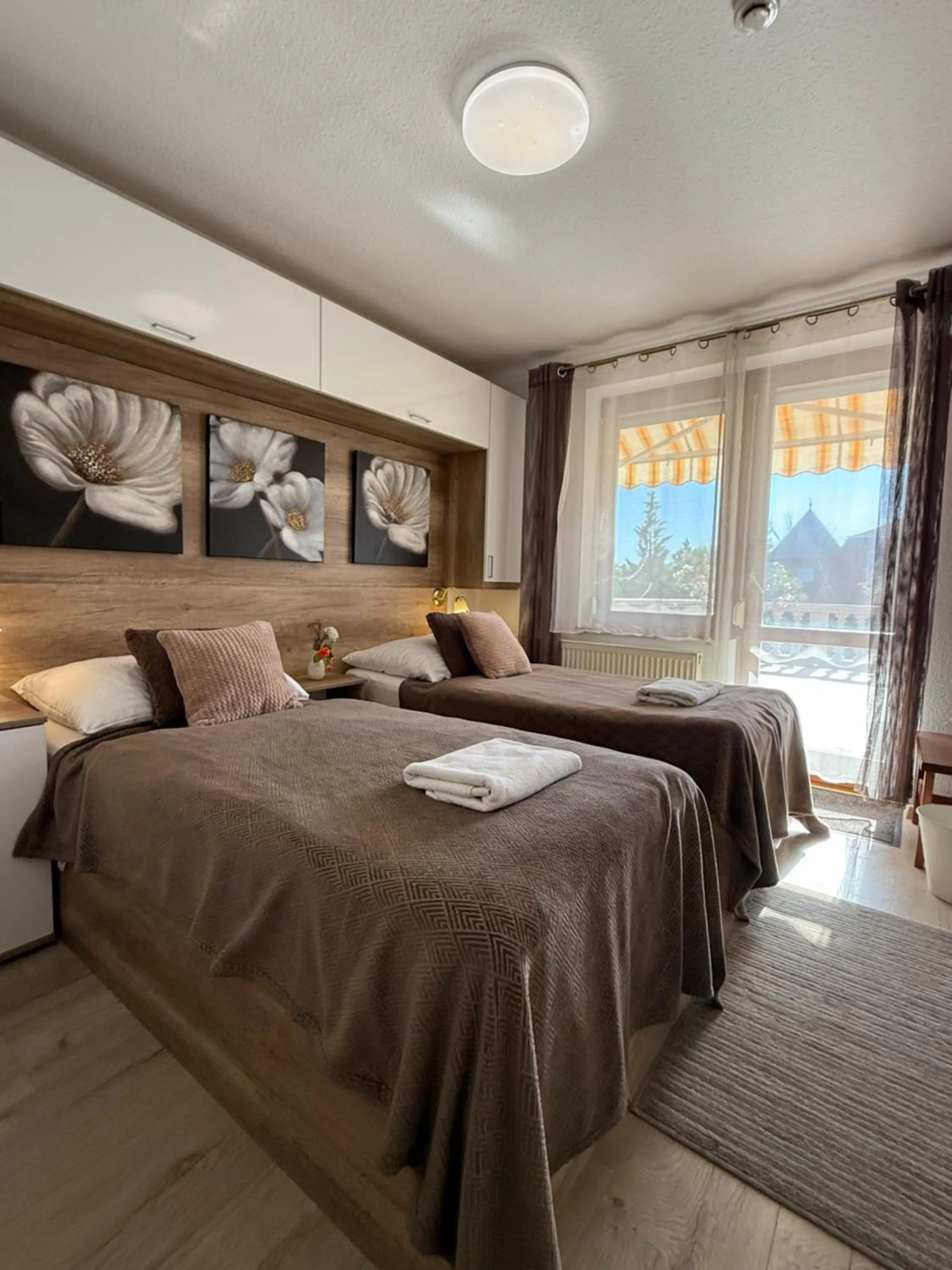 Bed in Le Rose Suites & Park Hotel