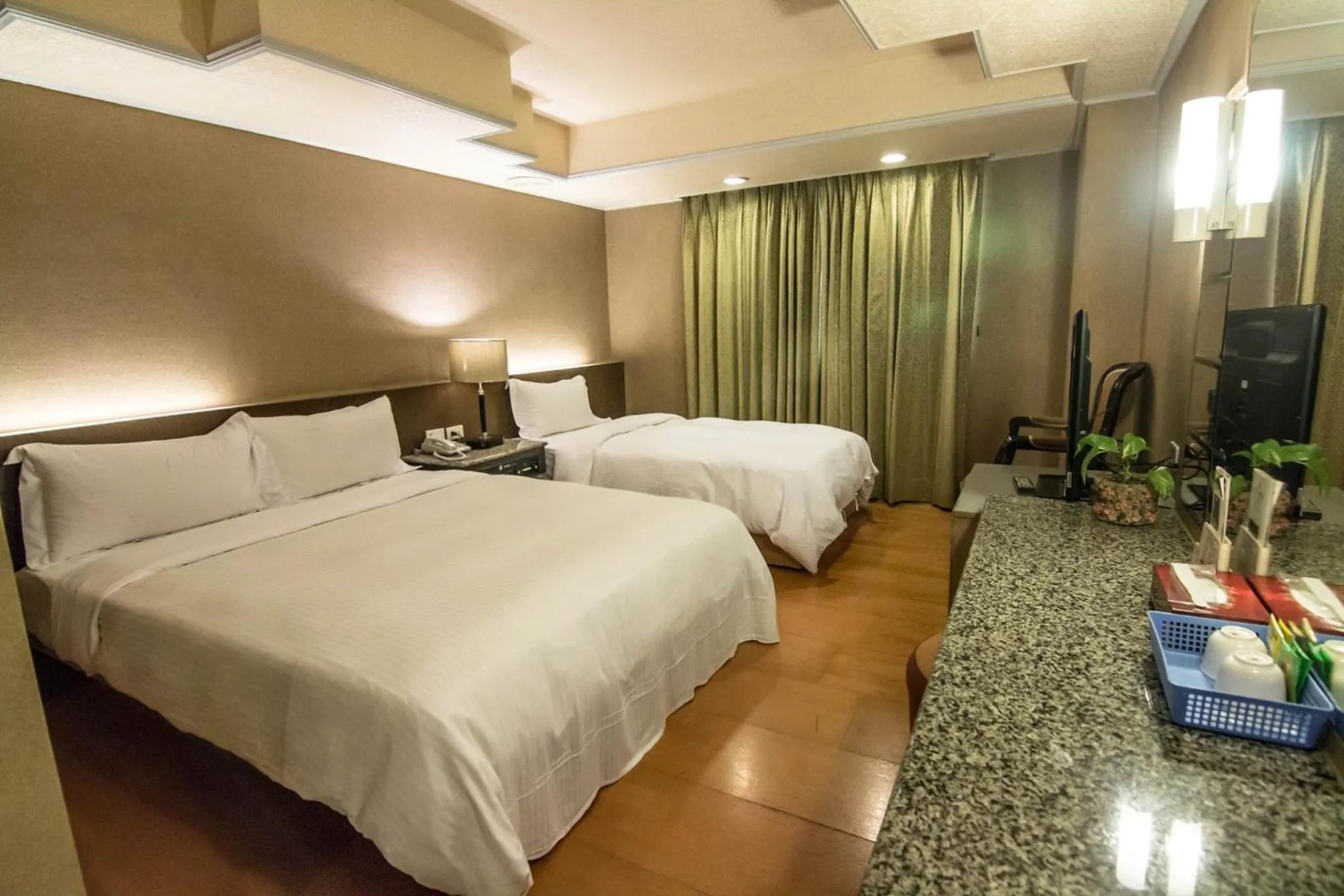 Bed in Katherine Plaza Hotel