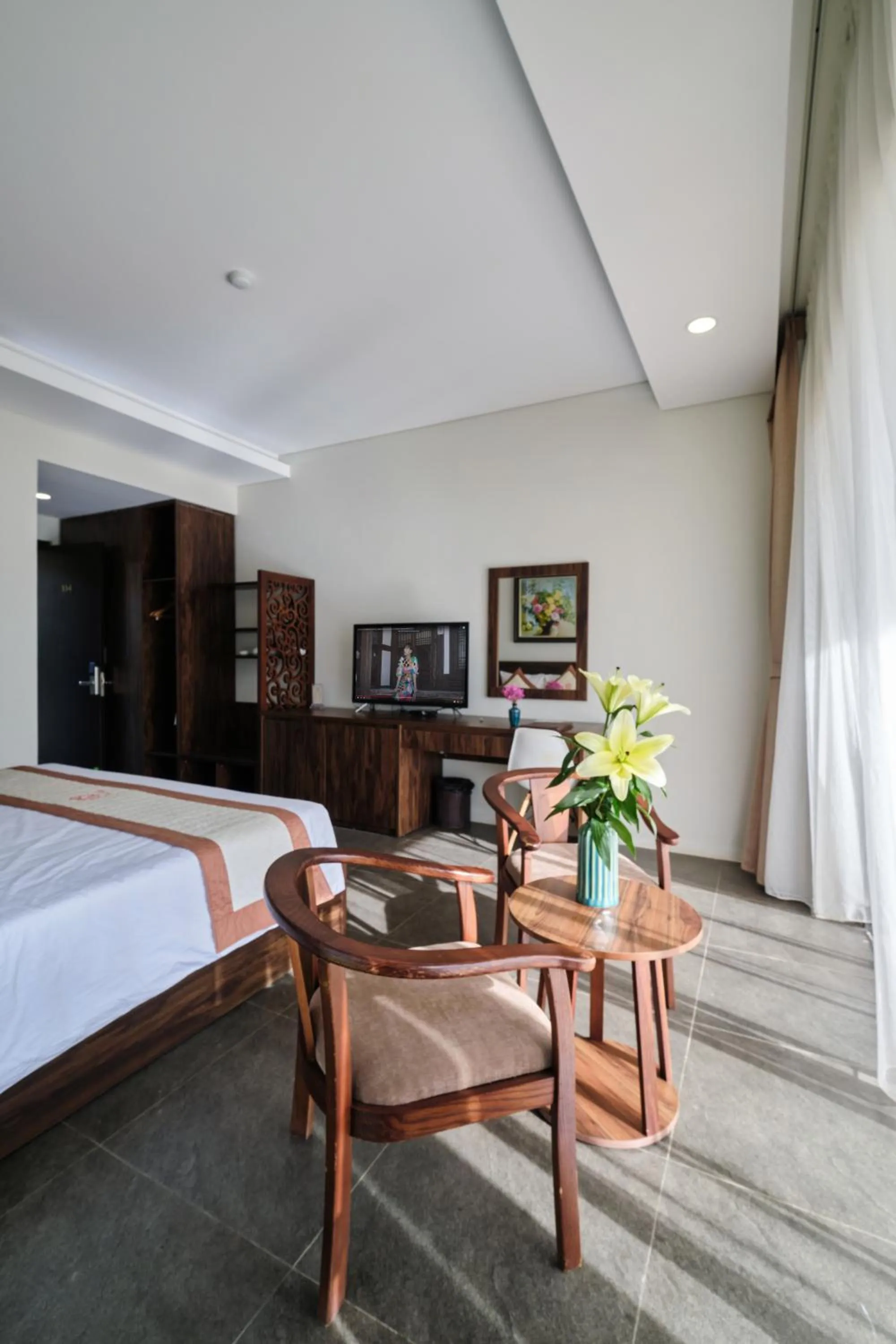 Seating area, Bed in Sea Star Resort