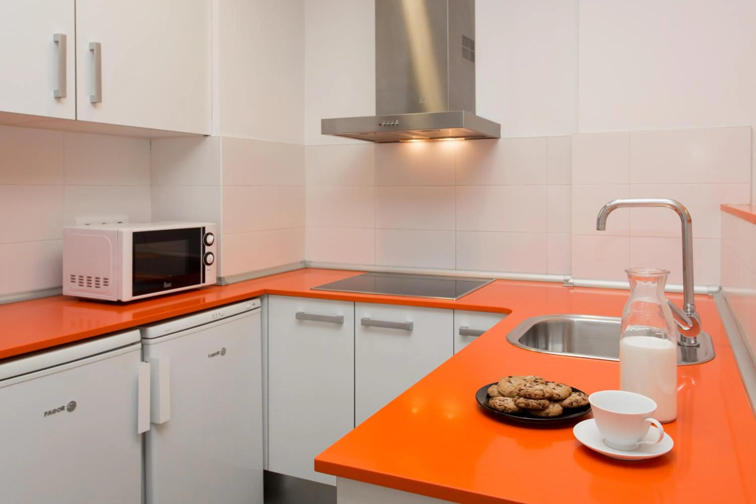 Kitchen or kitchenette in 08028 Apartments