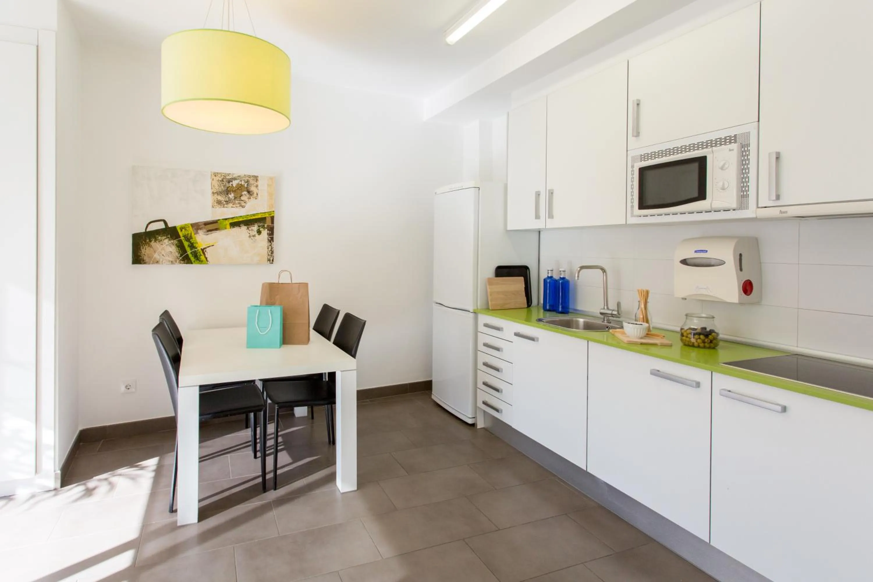 Kitchen or kitchenette in 08028 Apartments