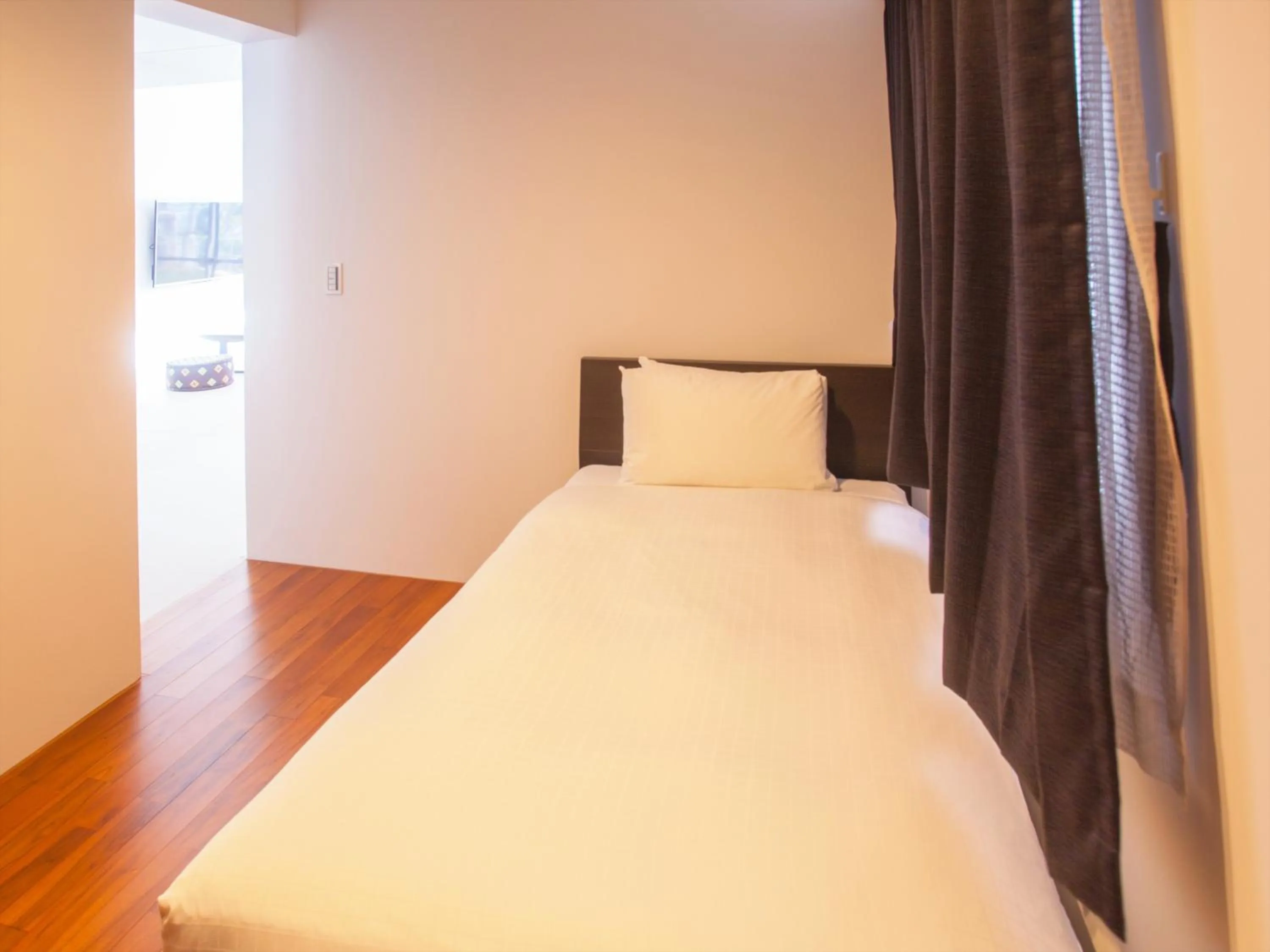 Bedroom, Bed in Kariyushi Condominium Resort Onna Maeda Base