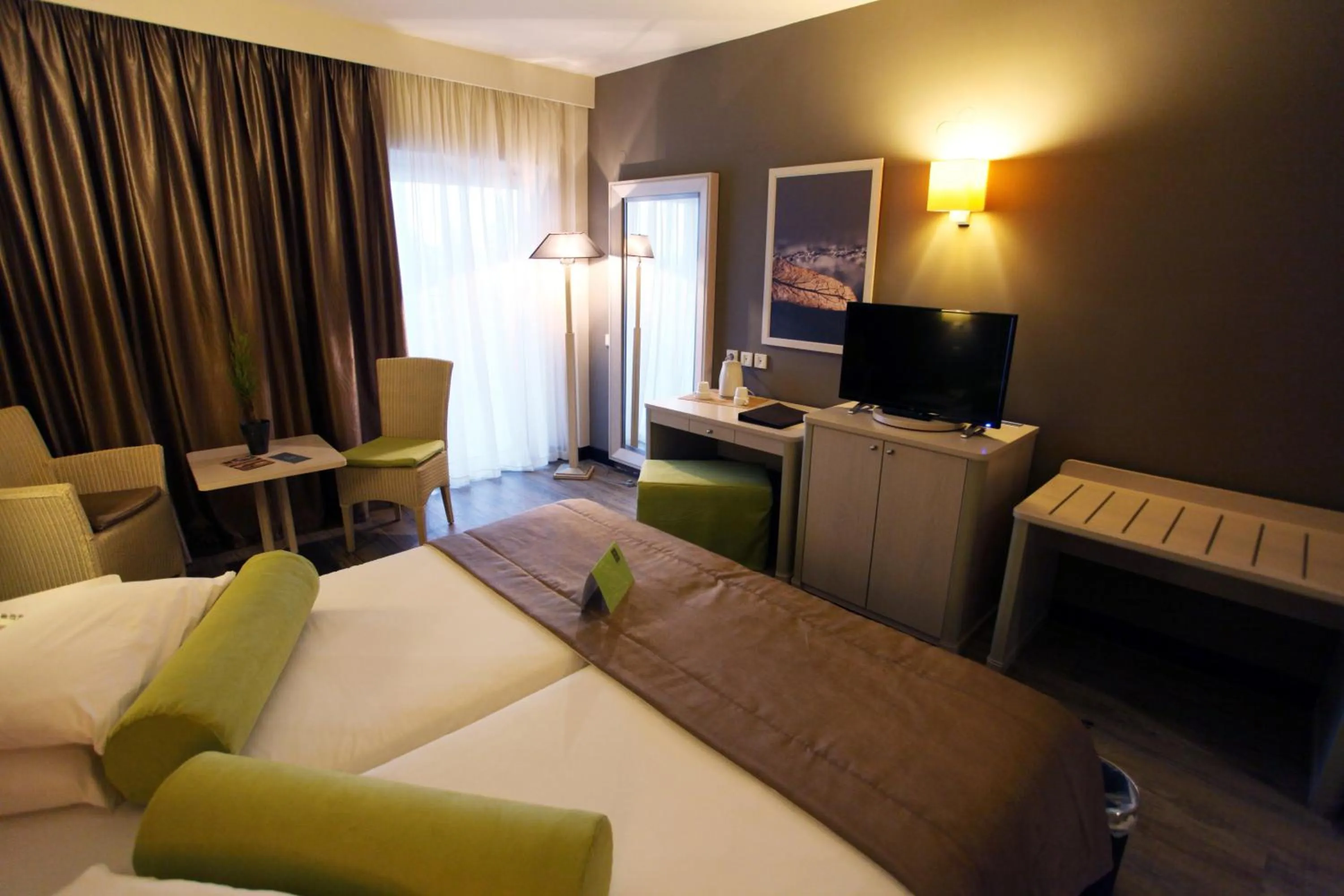 Bed in Dion Palace Resort and Spa