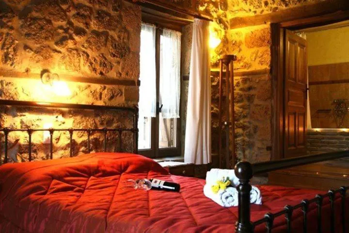 Bed in Pigi Tarlampa Hotel