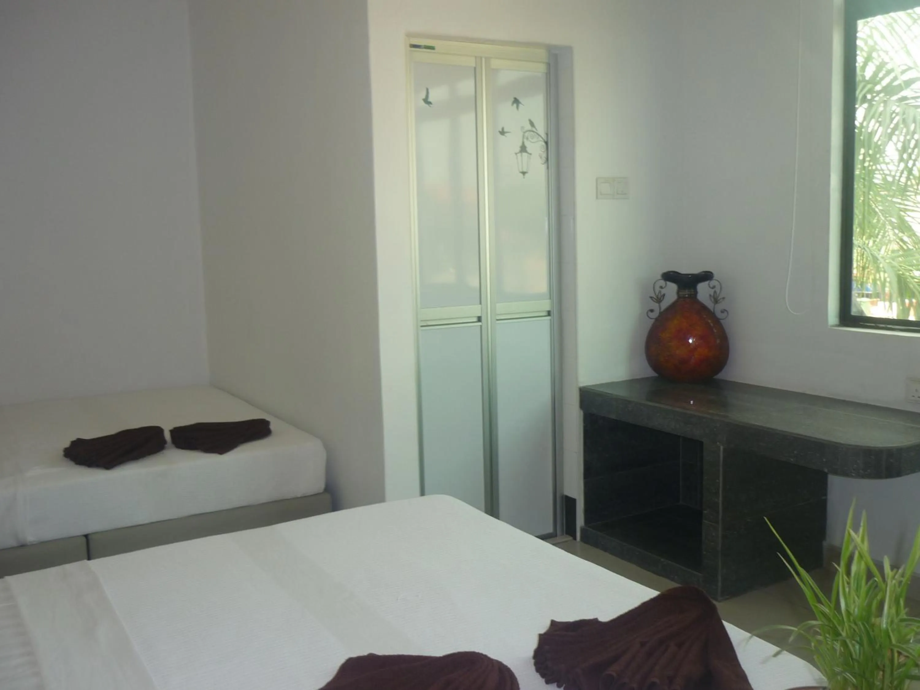 Bed in Hotel Paka INN