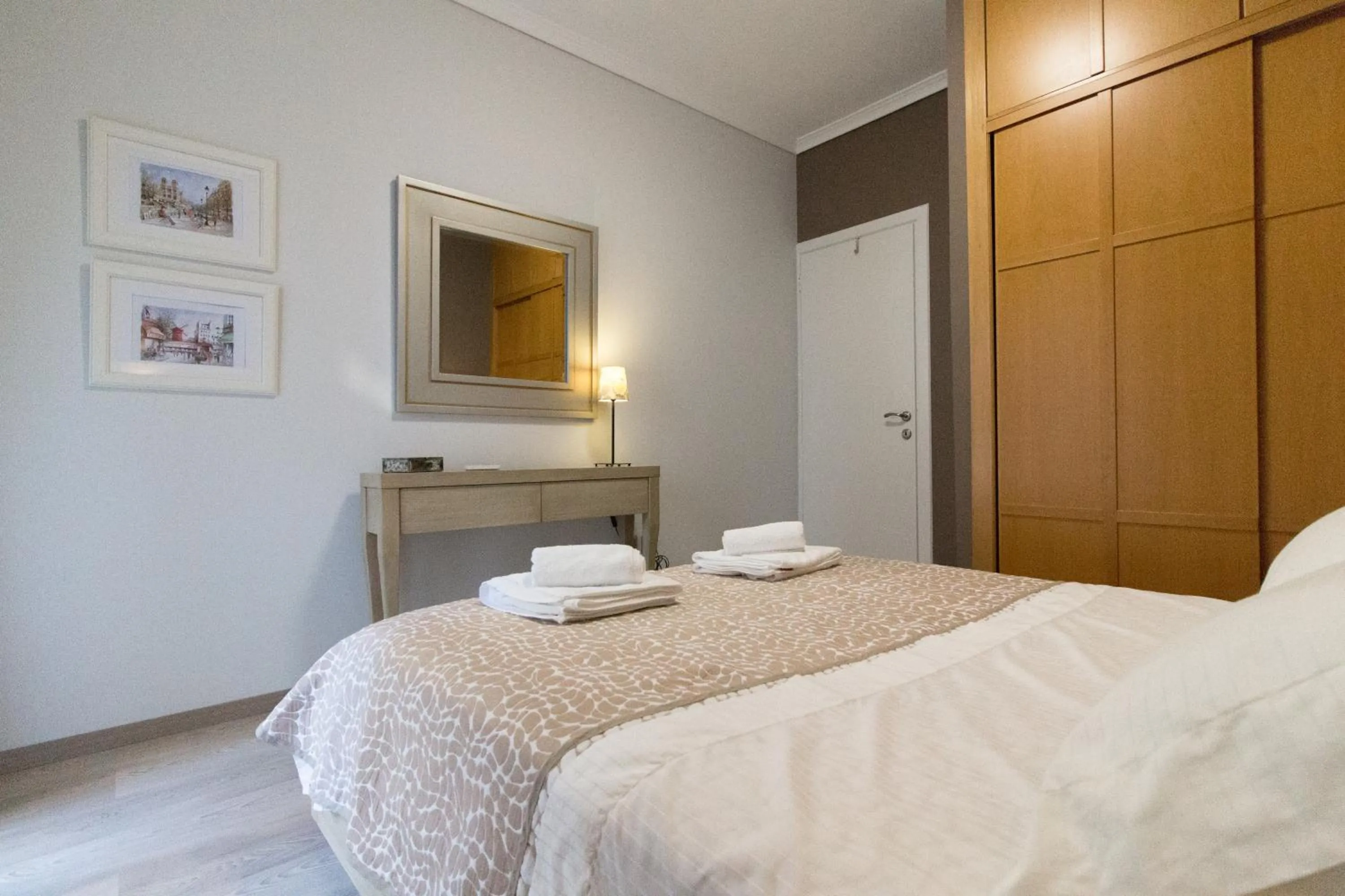 Bed in Luxury Apartment Philoxenia