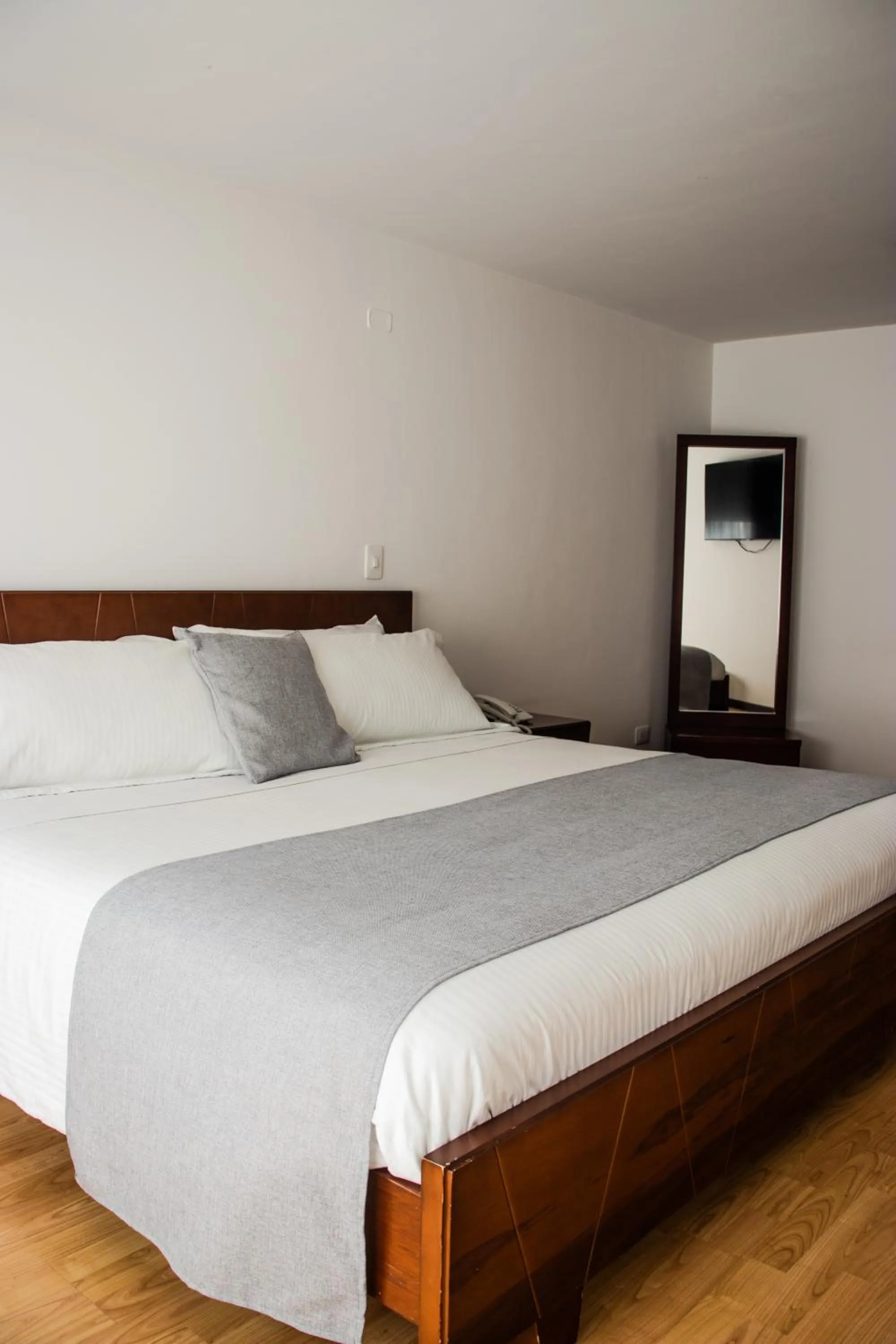 Bed in Nogal Suite Hotel Pasto