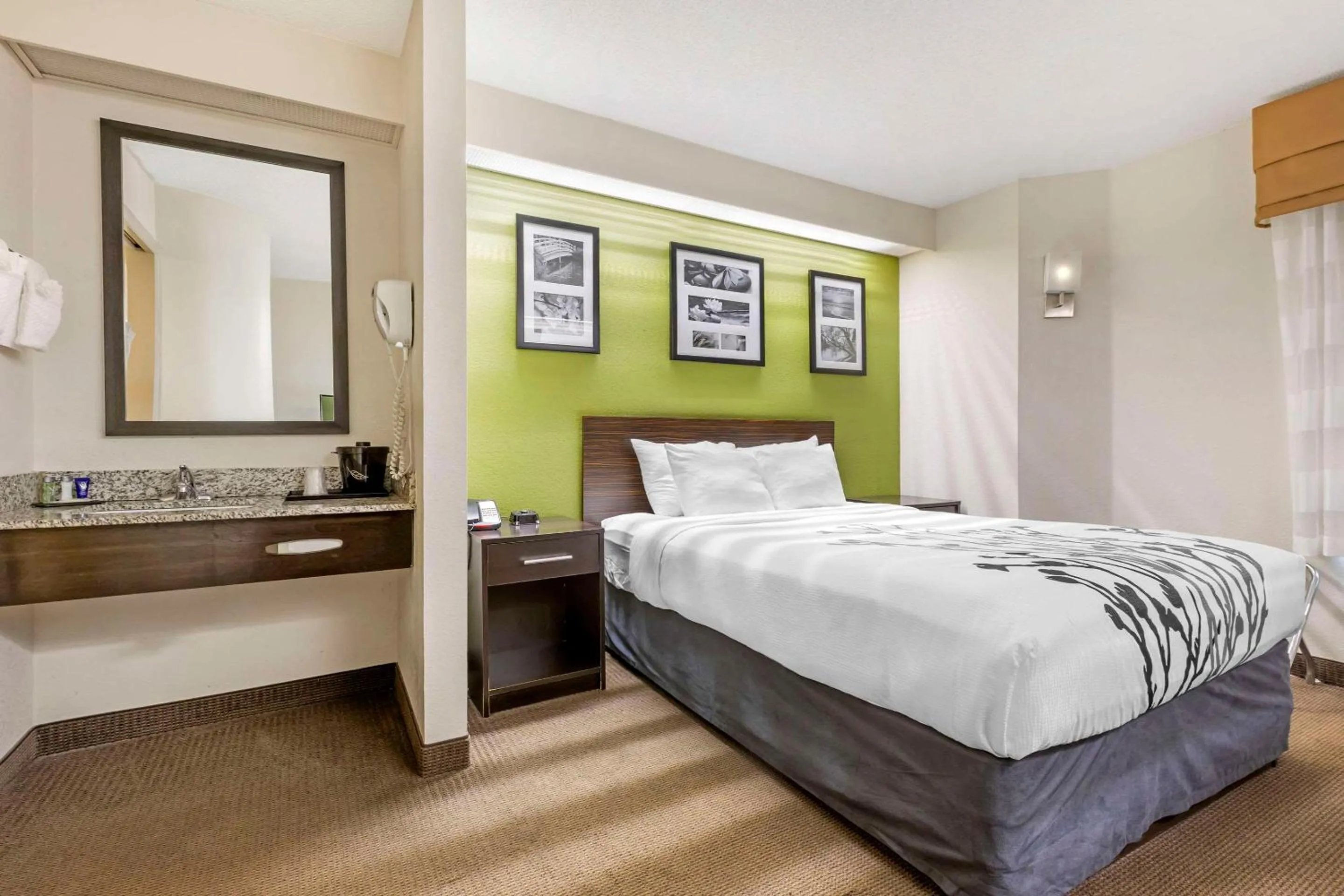 Bed in Sleep Inn at Greenville Convention Center