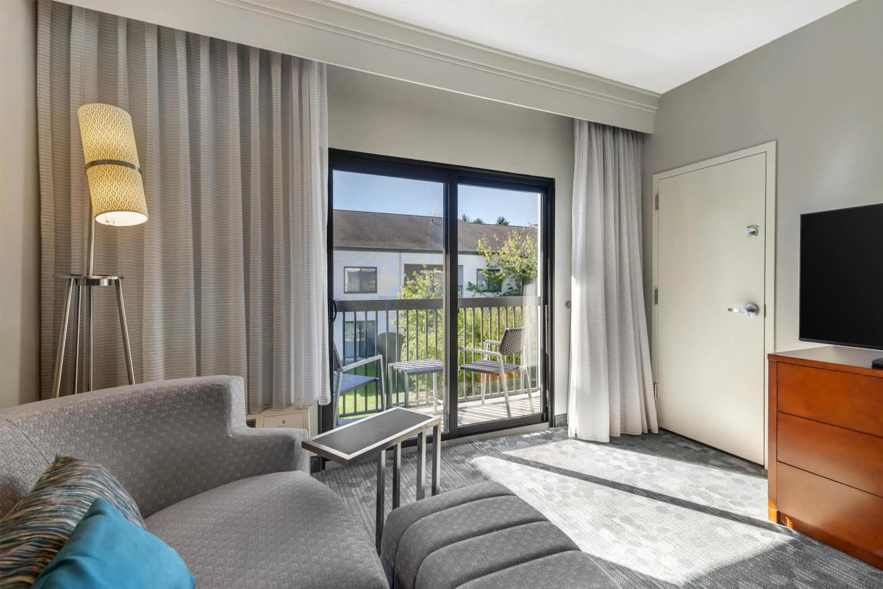 One-Bedroom King Suite with Courtyard Balcony in Sonesta Select Newport Middletown One-Bedroom King Suite with Courtyard Balcony in Sonesta Select Newport Middletown