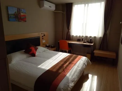 Bed in JUNYI Hotel Niongbo Xiangshan Bus Station