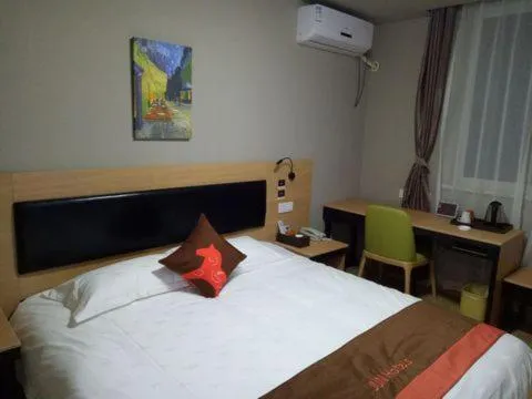 Bed in JUNYI Hotel Niongbo Xiangshan Bus Station