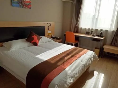 Bed in JUNYI Hotel Niongbo Xiangshan Bus Station