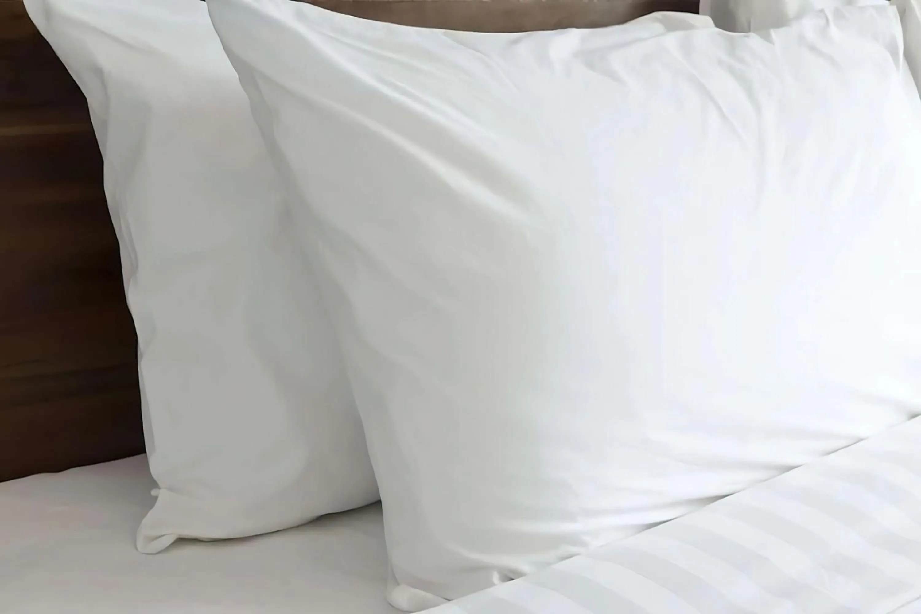 Bed in Sonesta ES Suites Raleigh Cary