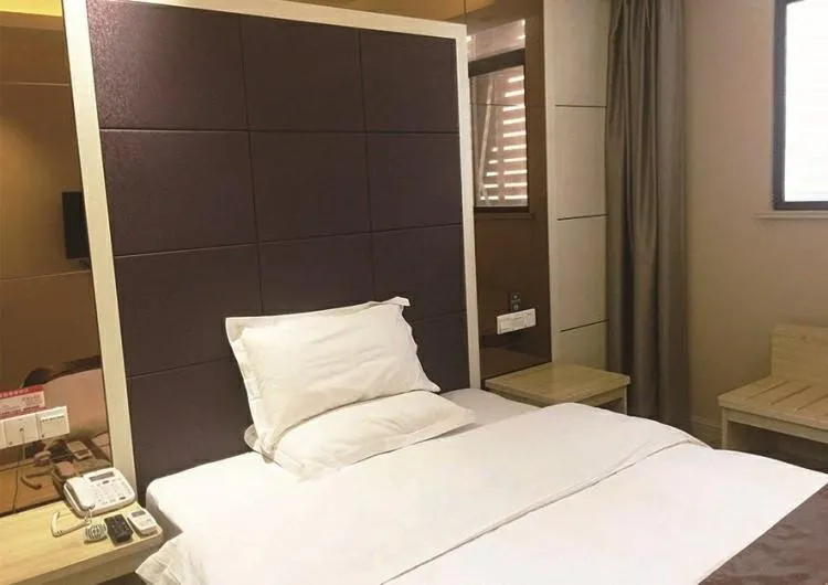 Bed in JUNYI Hotel Jiangsu Xuzhou Middle Xiyuan Road